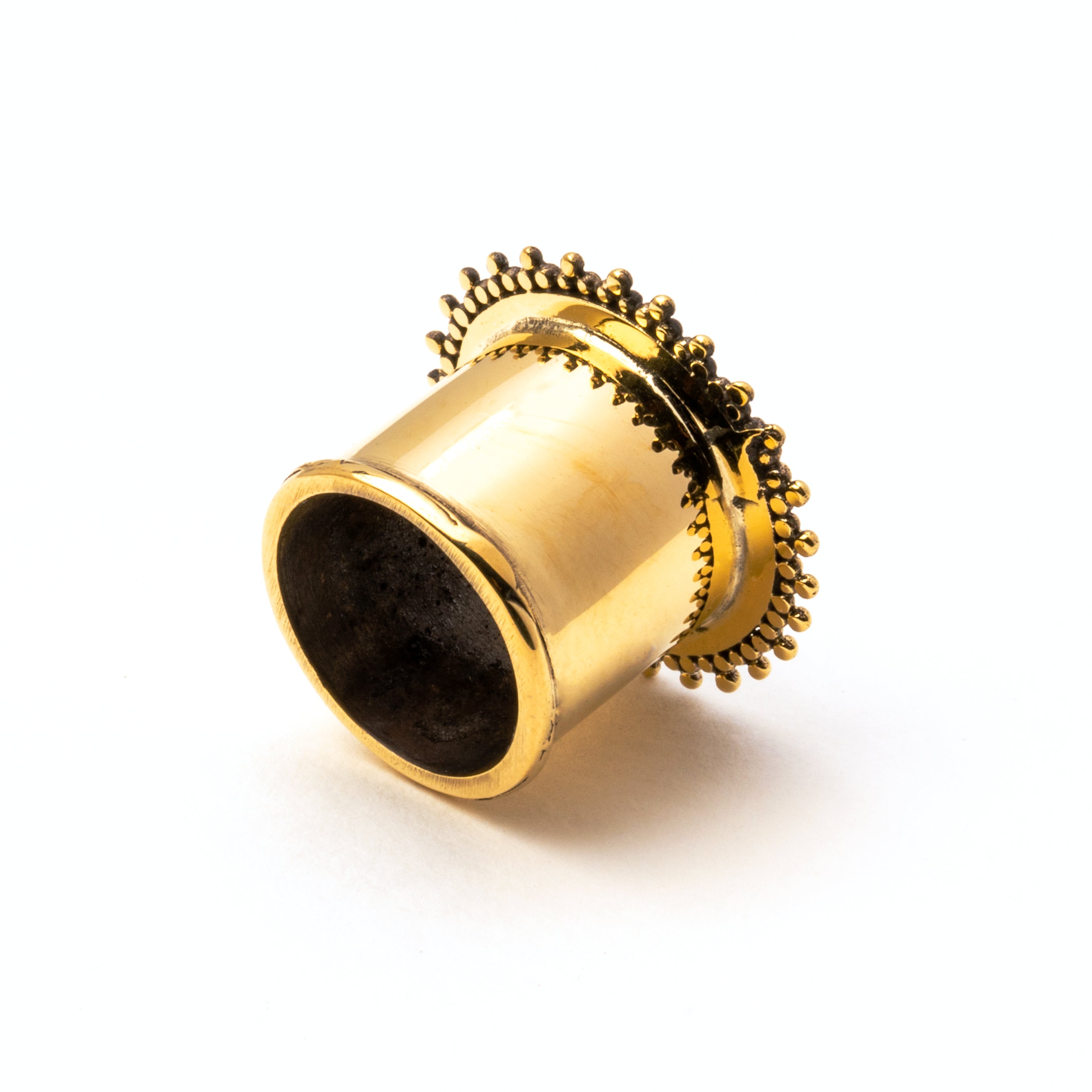 single golden brass Indian ear tunnel back view