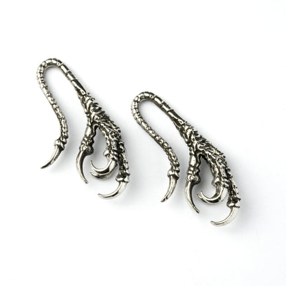 pair of silver brass dragon claw ear hangers right side view