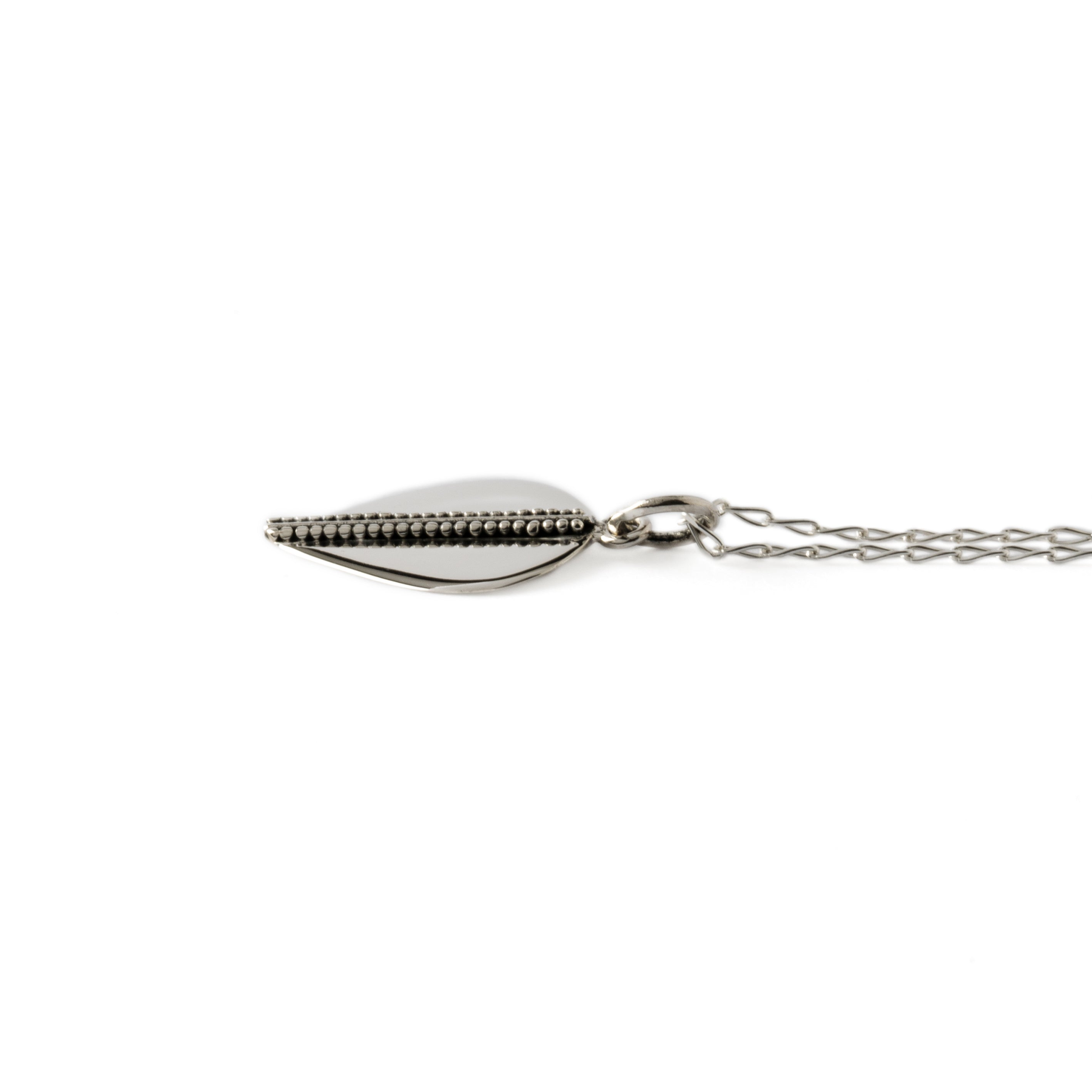 Drop silver charm necklace side view