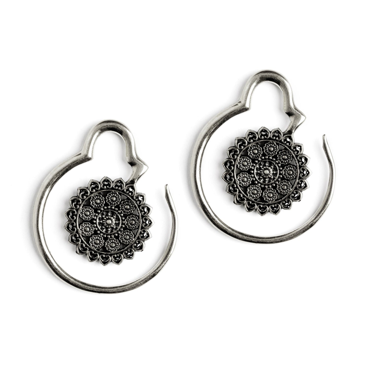 pair of silver brass hook ear hangers with intricate floral filigree frontal view