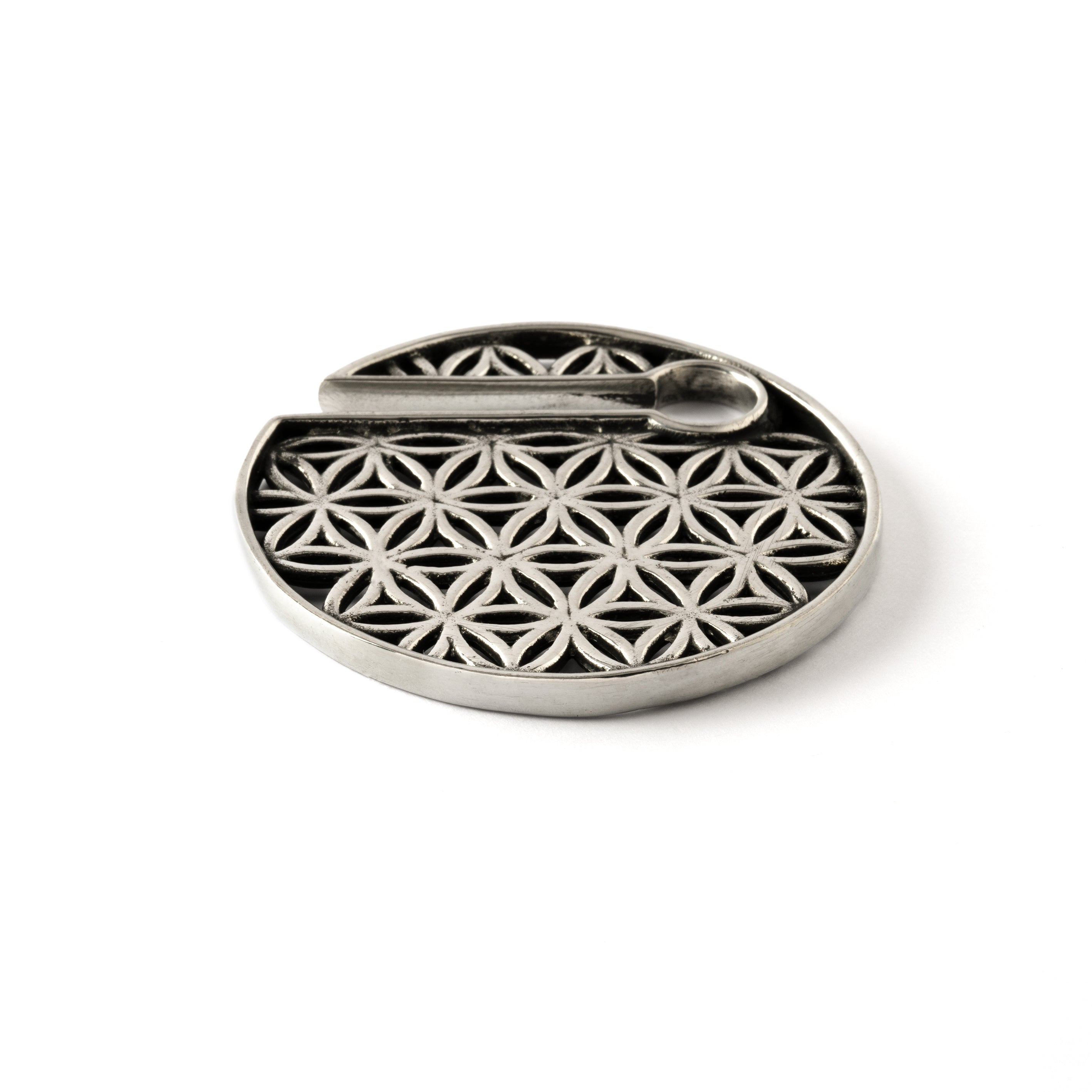 single white brass flower of life disc ear weight hanger side close up view