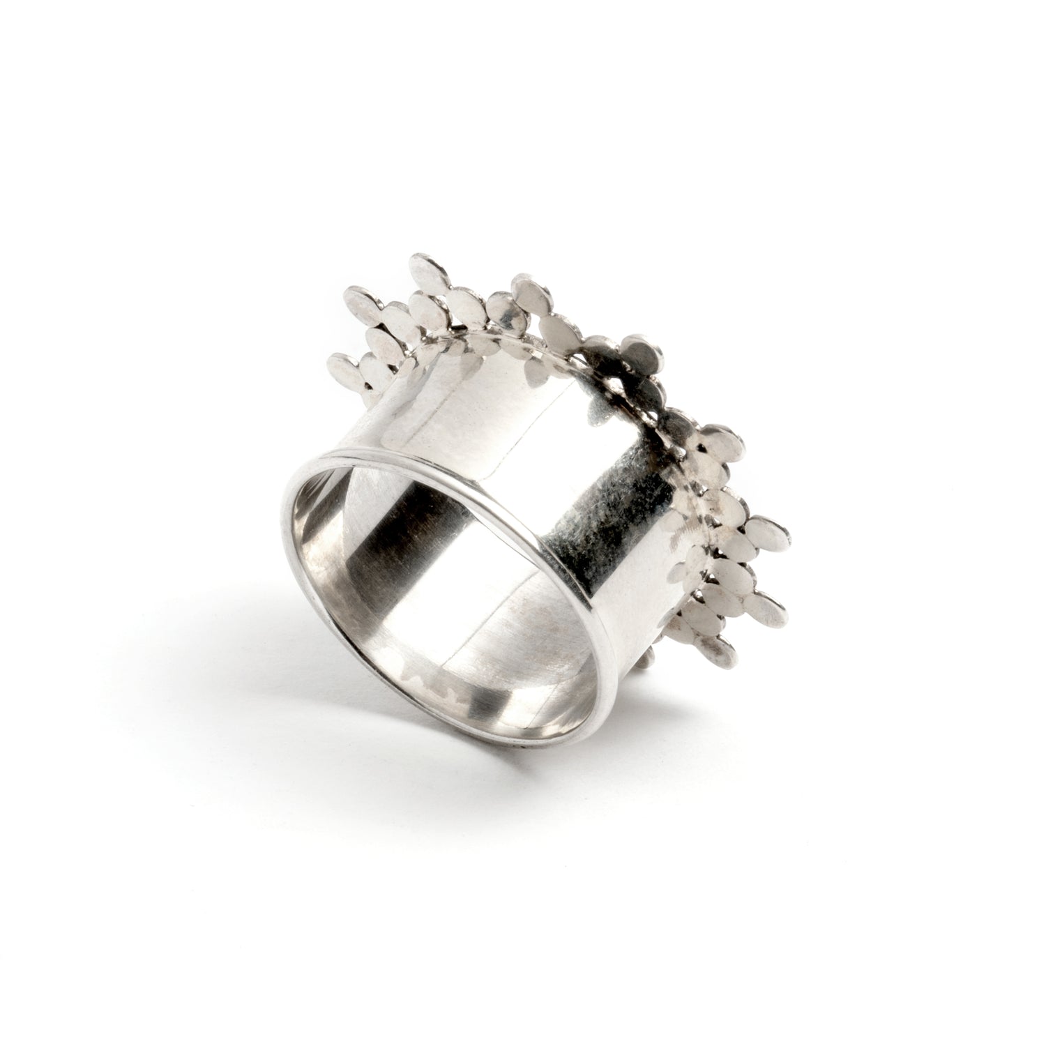 single silver spheres flower ear tunnel back view