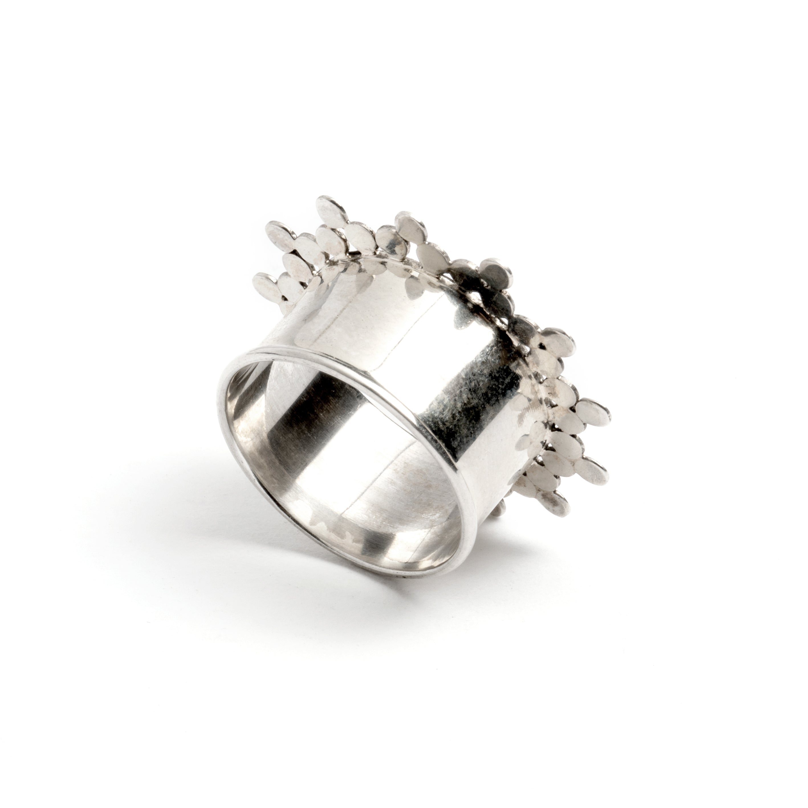 single silver spheres flower ear tunnel back view