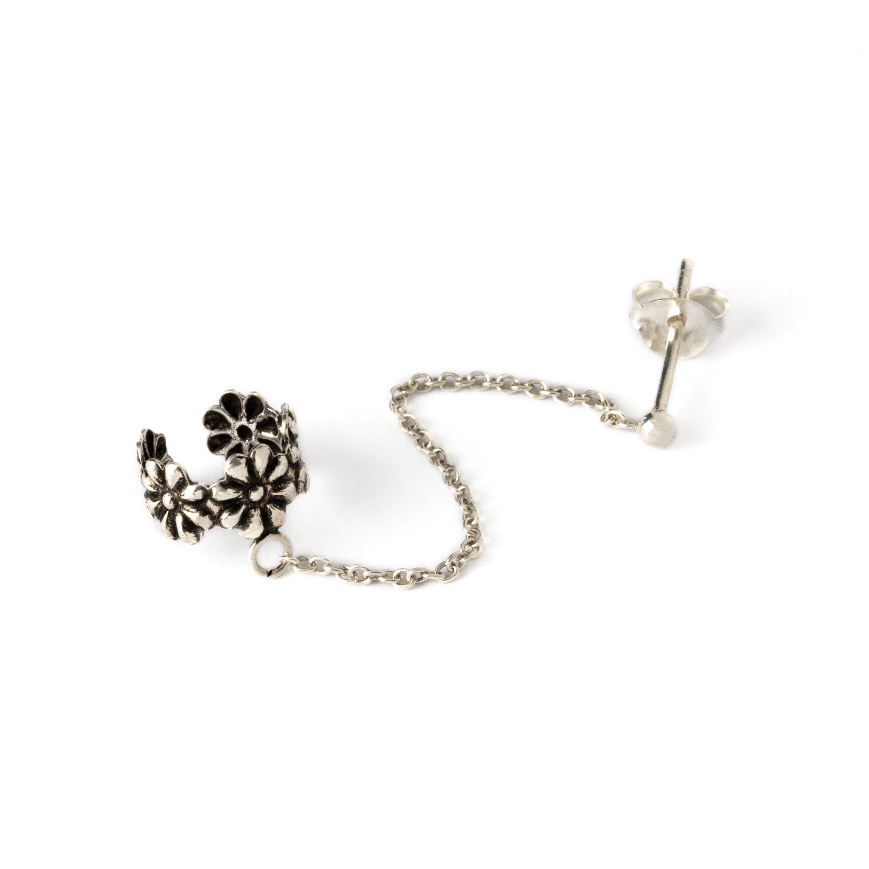 floral silver ear cuff chained to a stud earring frontal view