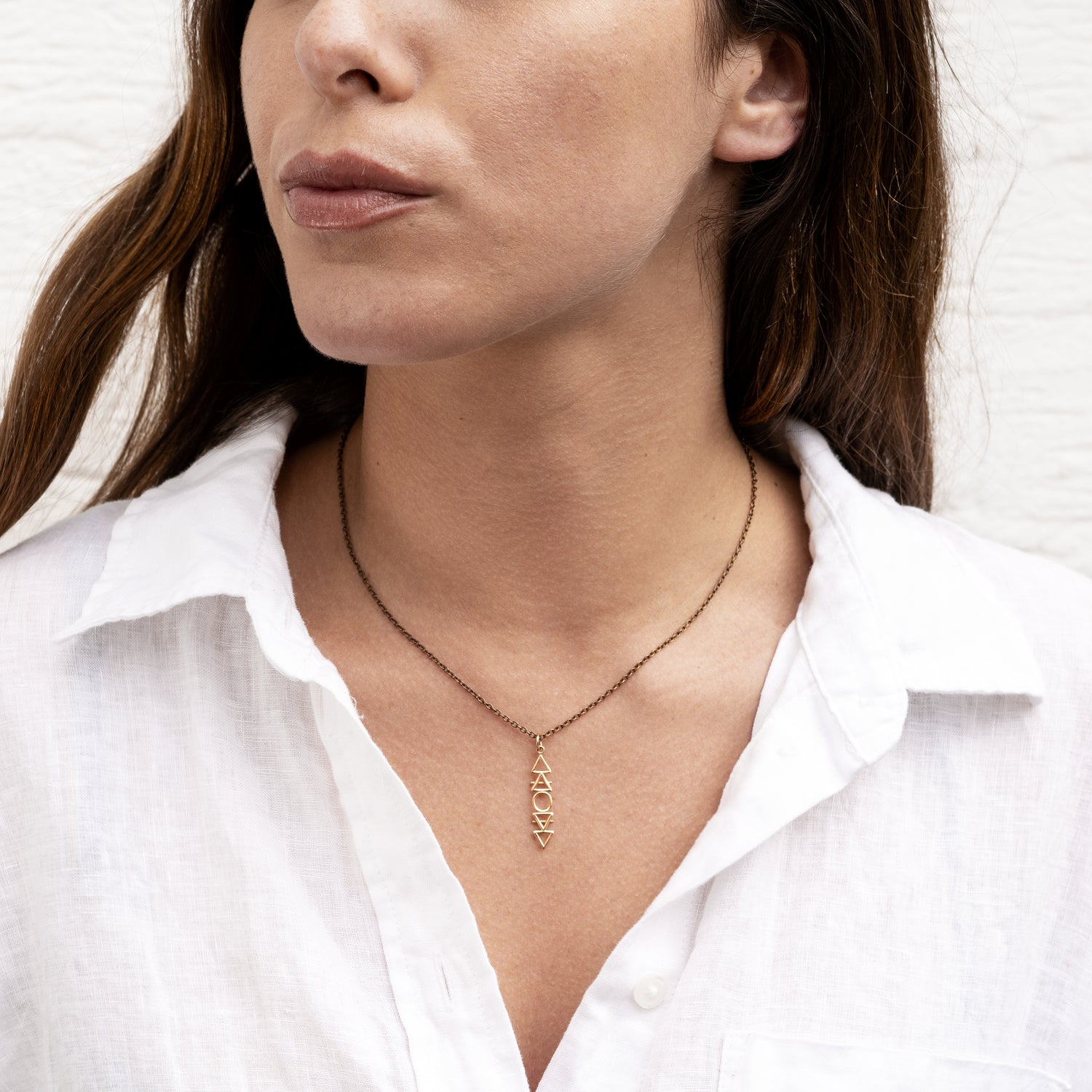 model wearing Four Elements Necklace