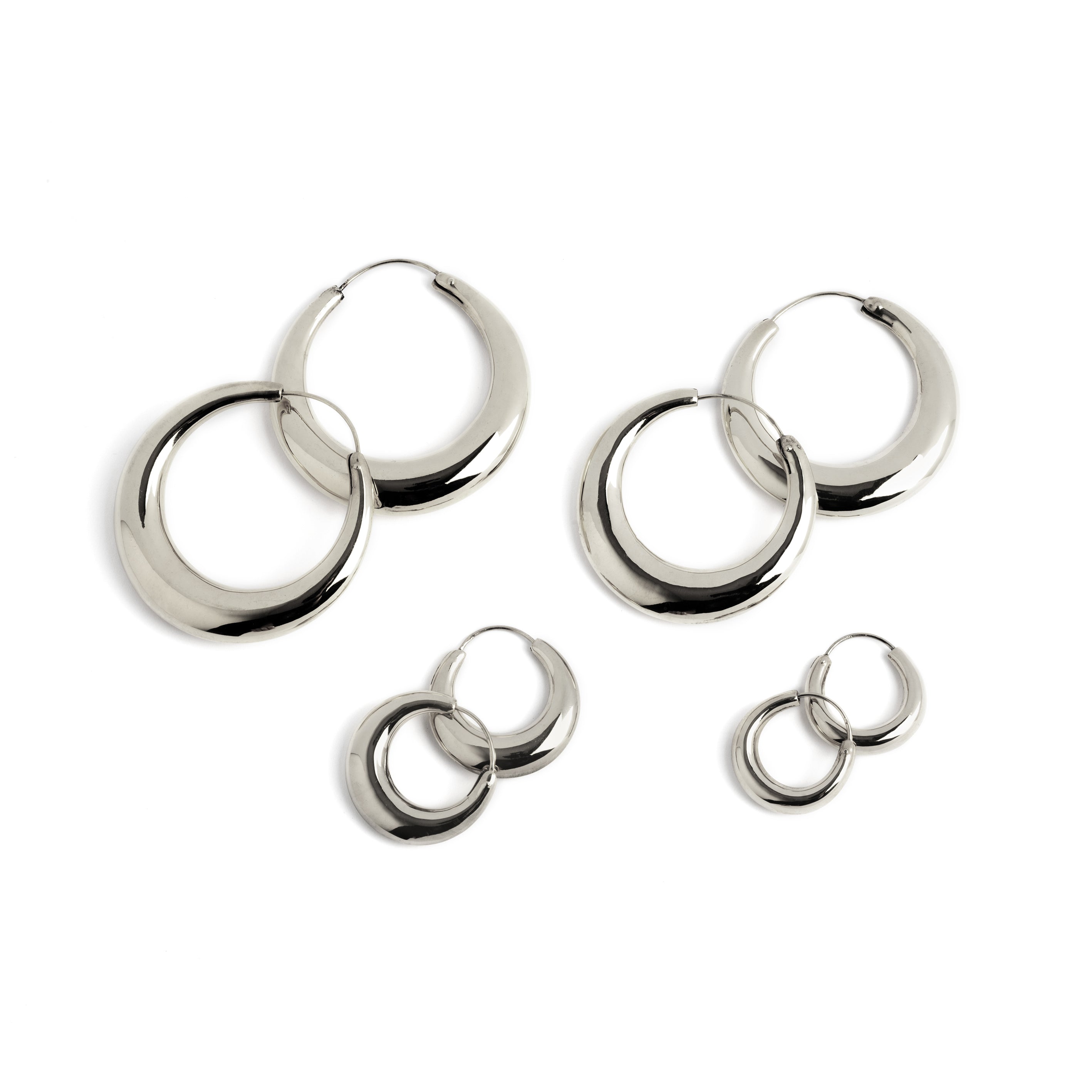 Different sizes of Silver Glow Hoop Earrings frontal view