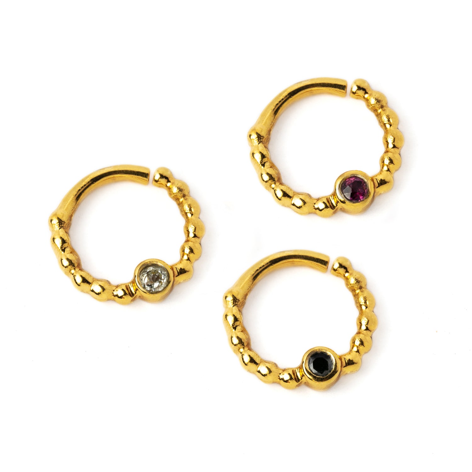 gold dotted septum ring with Black Spinal, Ruby & Topaz gemstones right side view