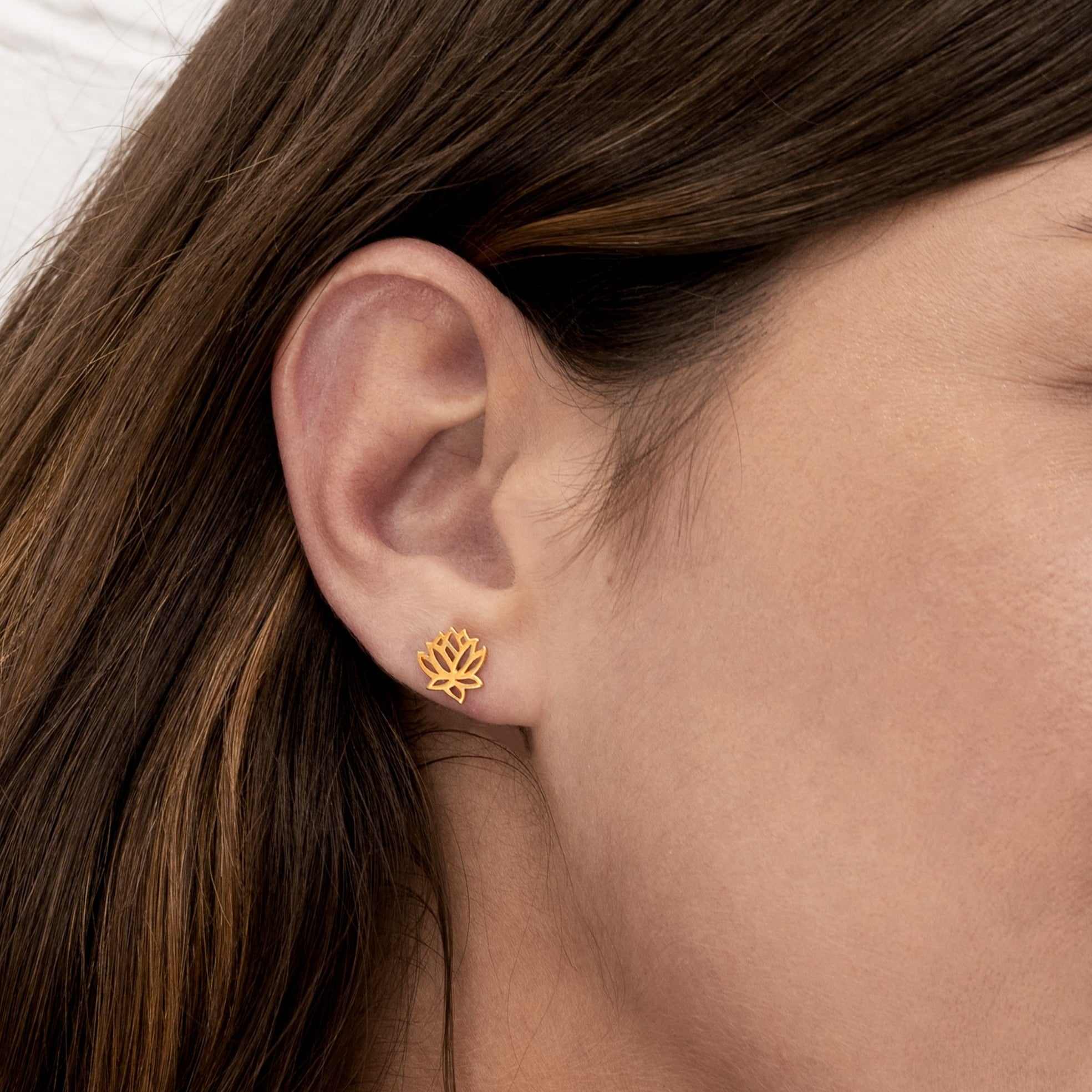 model wearing Gold Lotus contour stud earrings