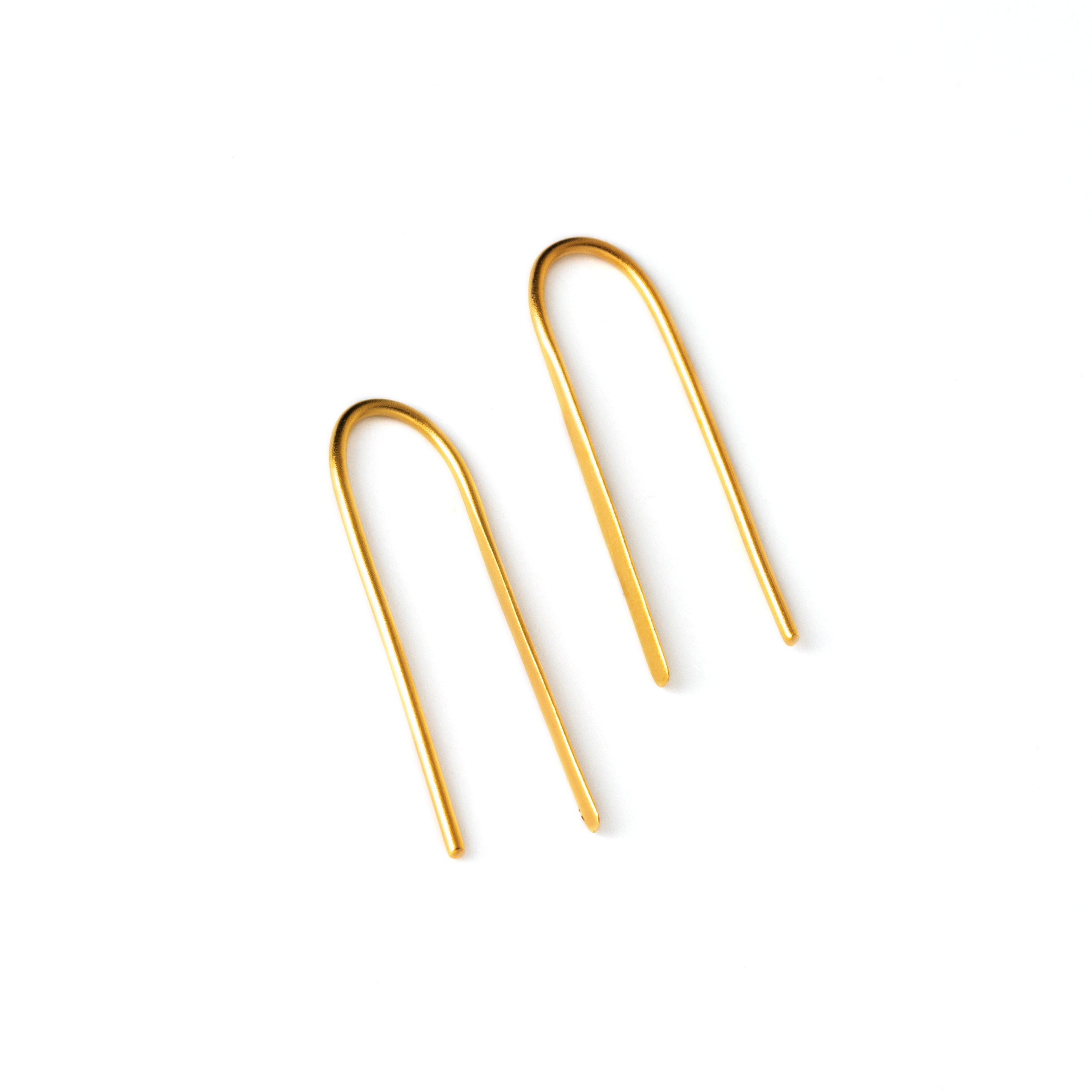 thin gold wire hook earrings shaped as an arc