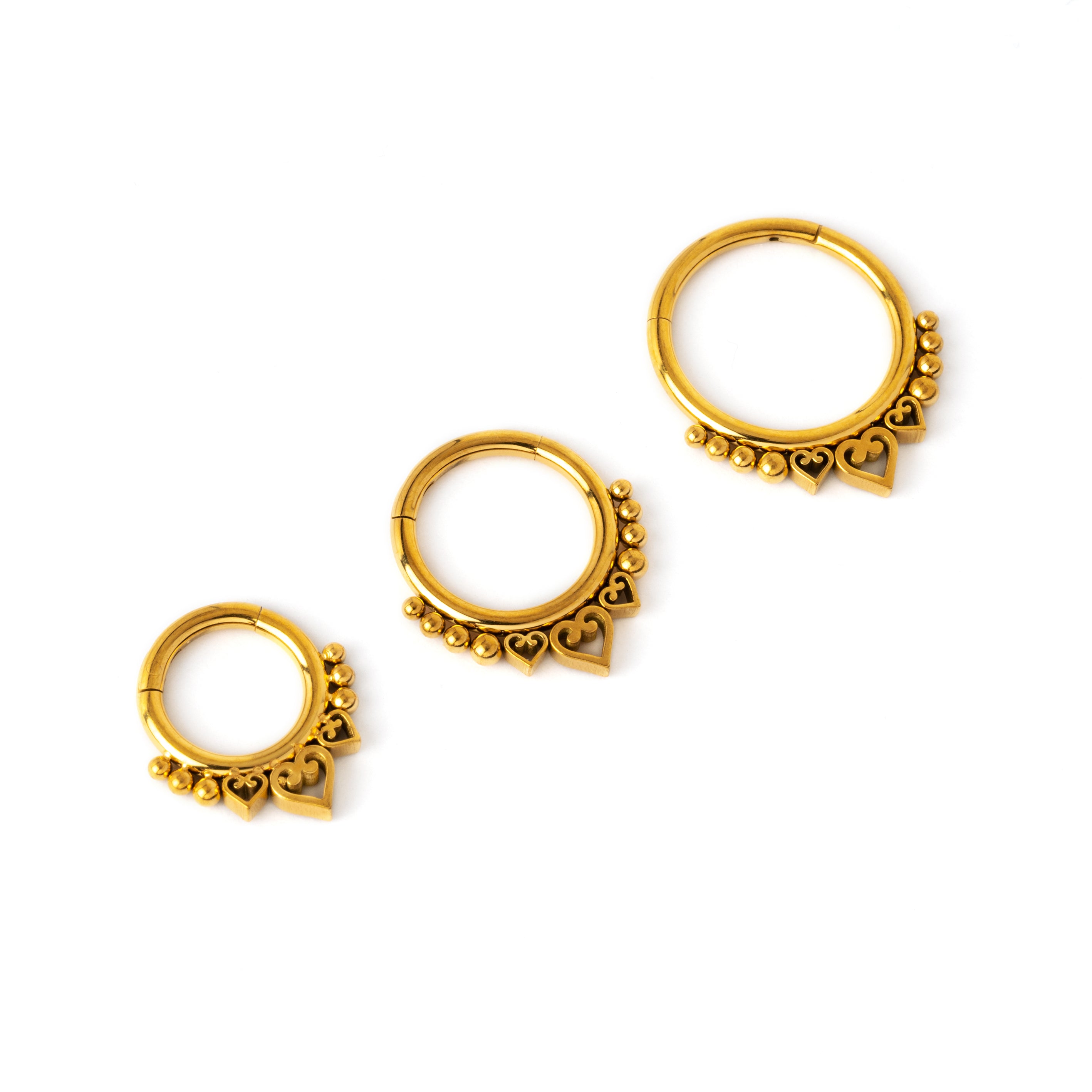 6mm, 8mm & 8mm Golden Neptune Septum Clickers side view