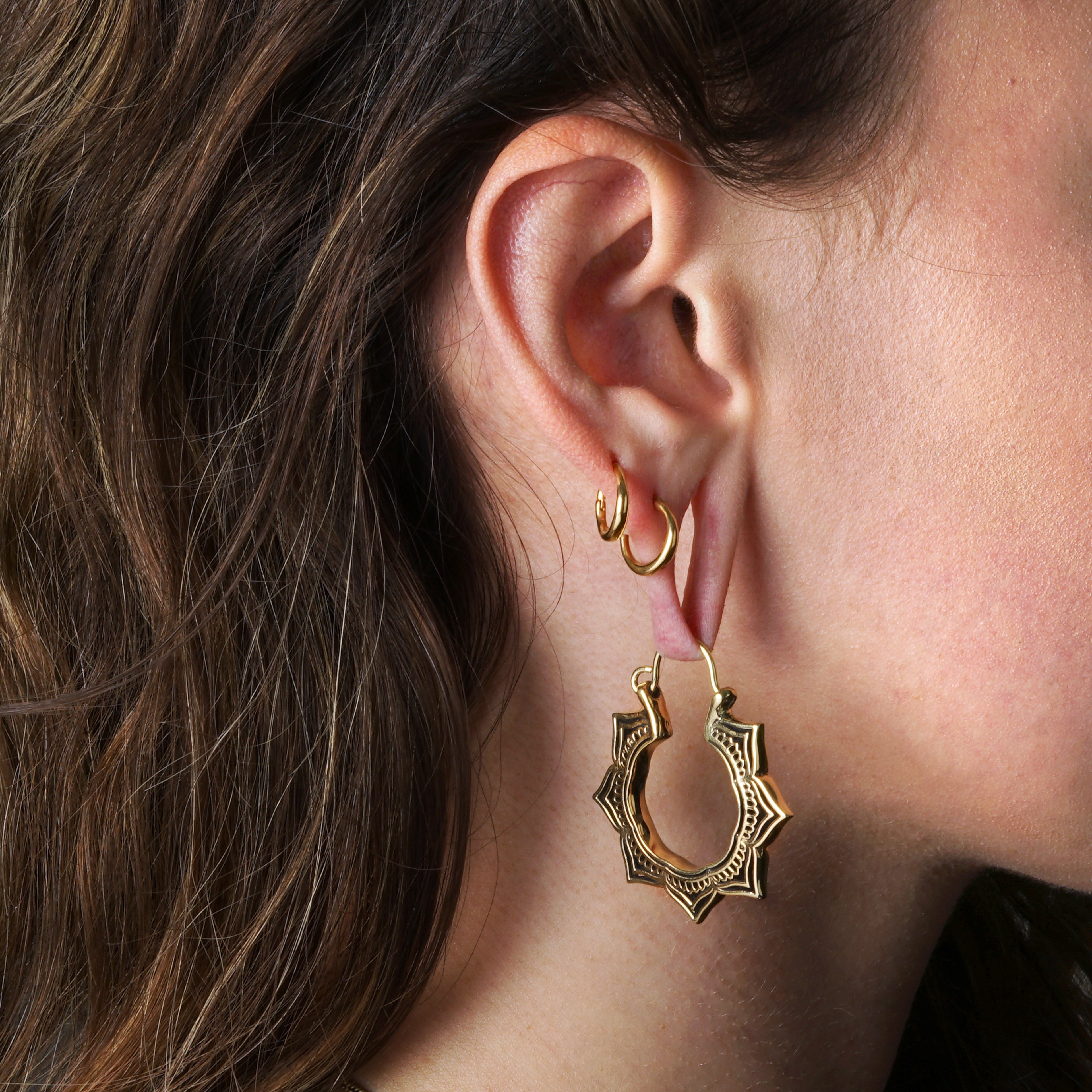model wearing Golden Padma Blossom Earrings
