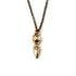 Tiny bronze Fertility goddess with etched spiral charm on a necklace frontal view