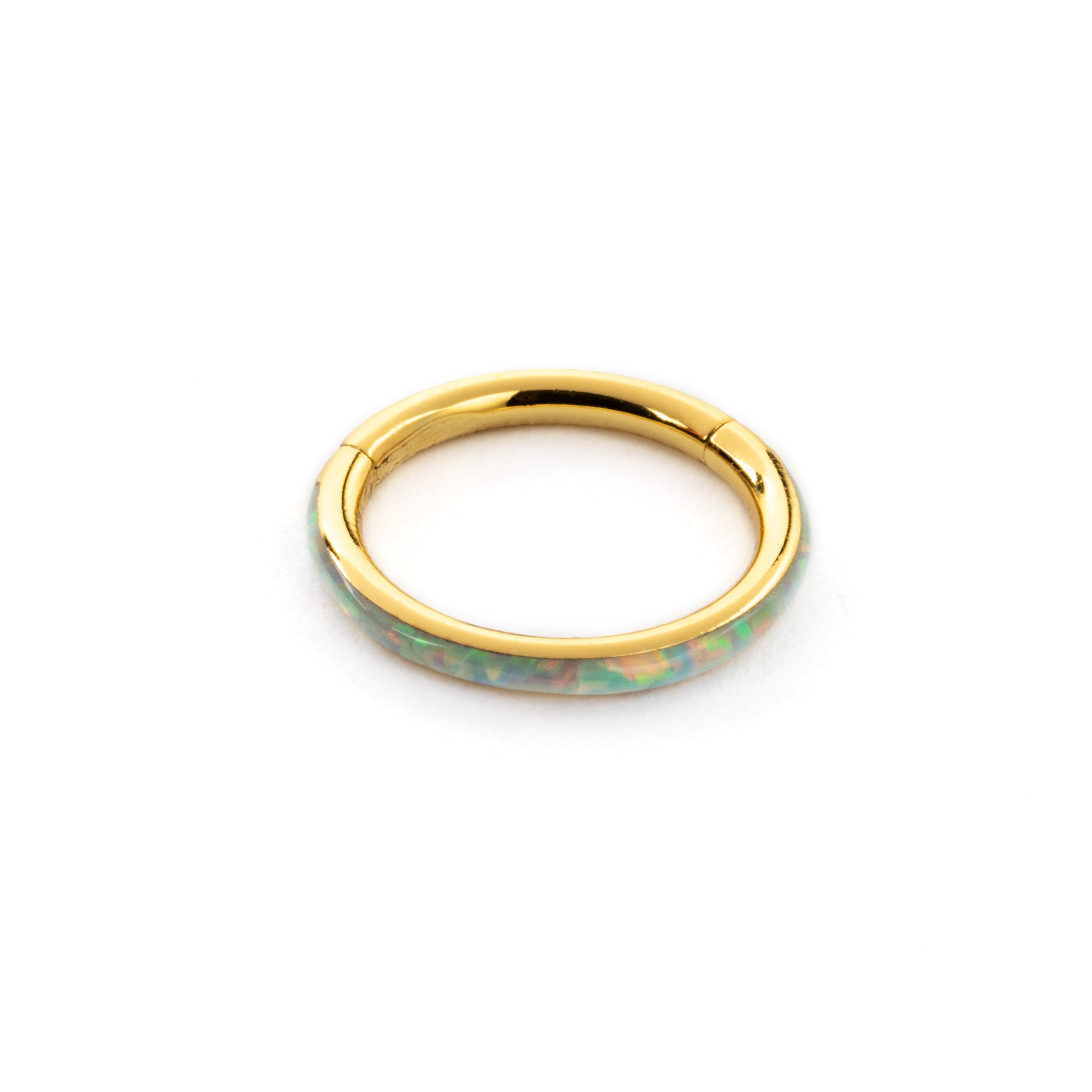 Gold surgical steel septum clicker ring with white opal inlay frontal view