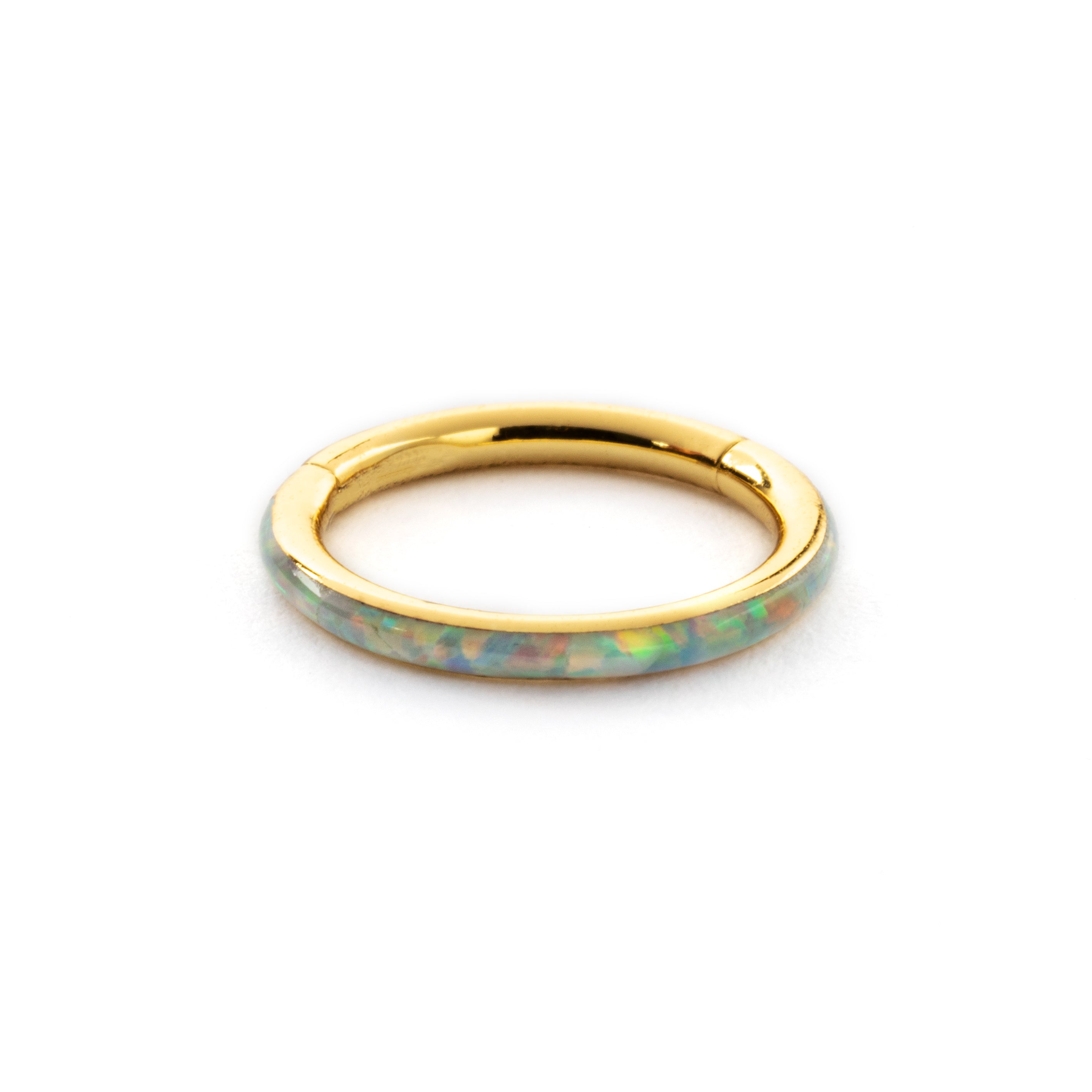 Gold surgical steel septum clicker ring with white opal inlay frontal view