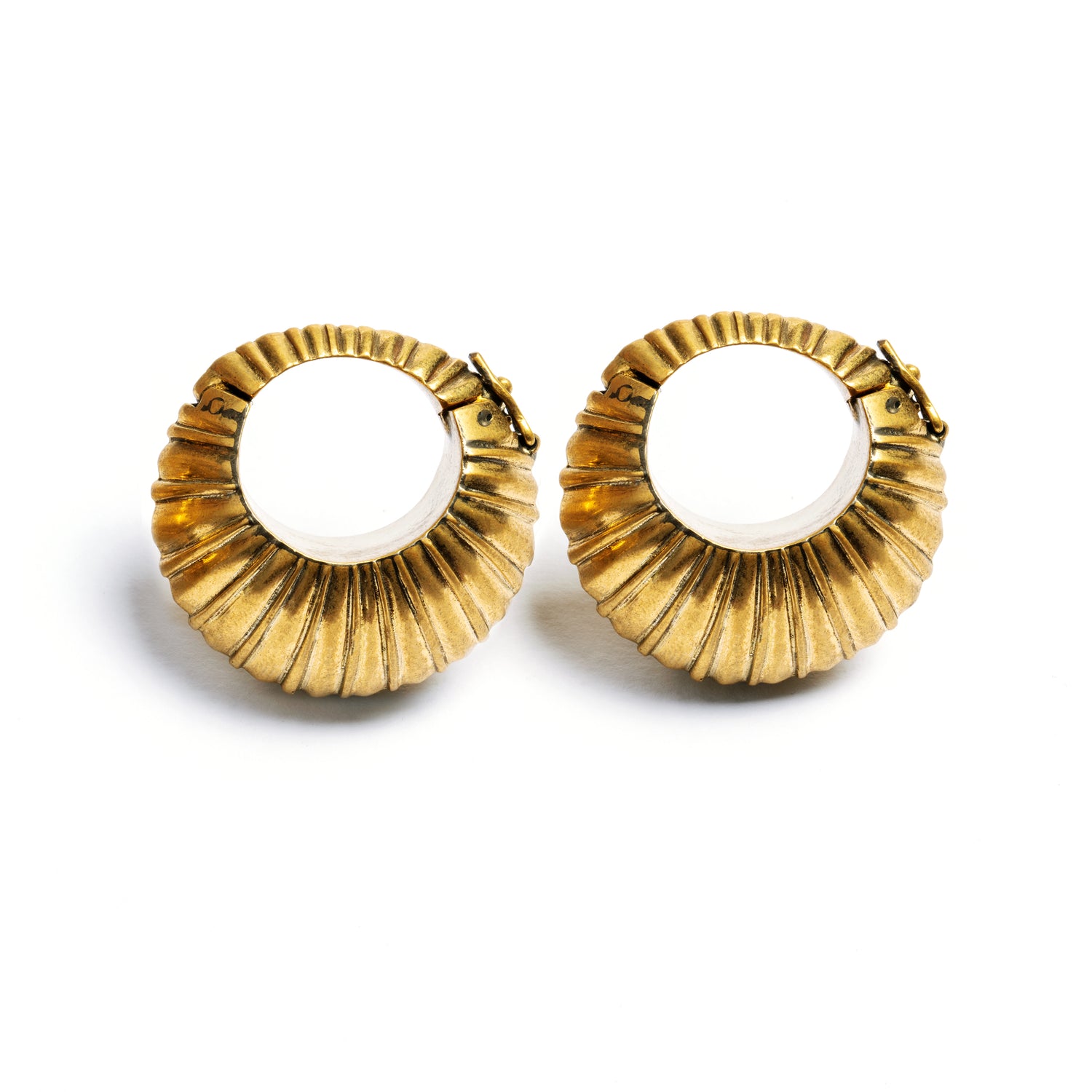 Pair of gold brass carved ear weights hoops frontal view