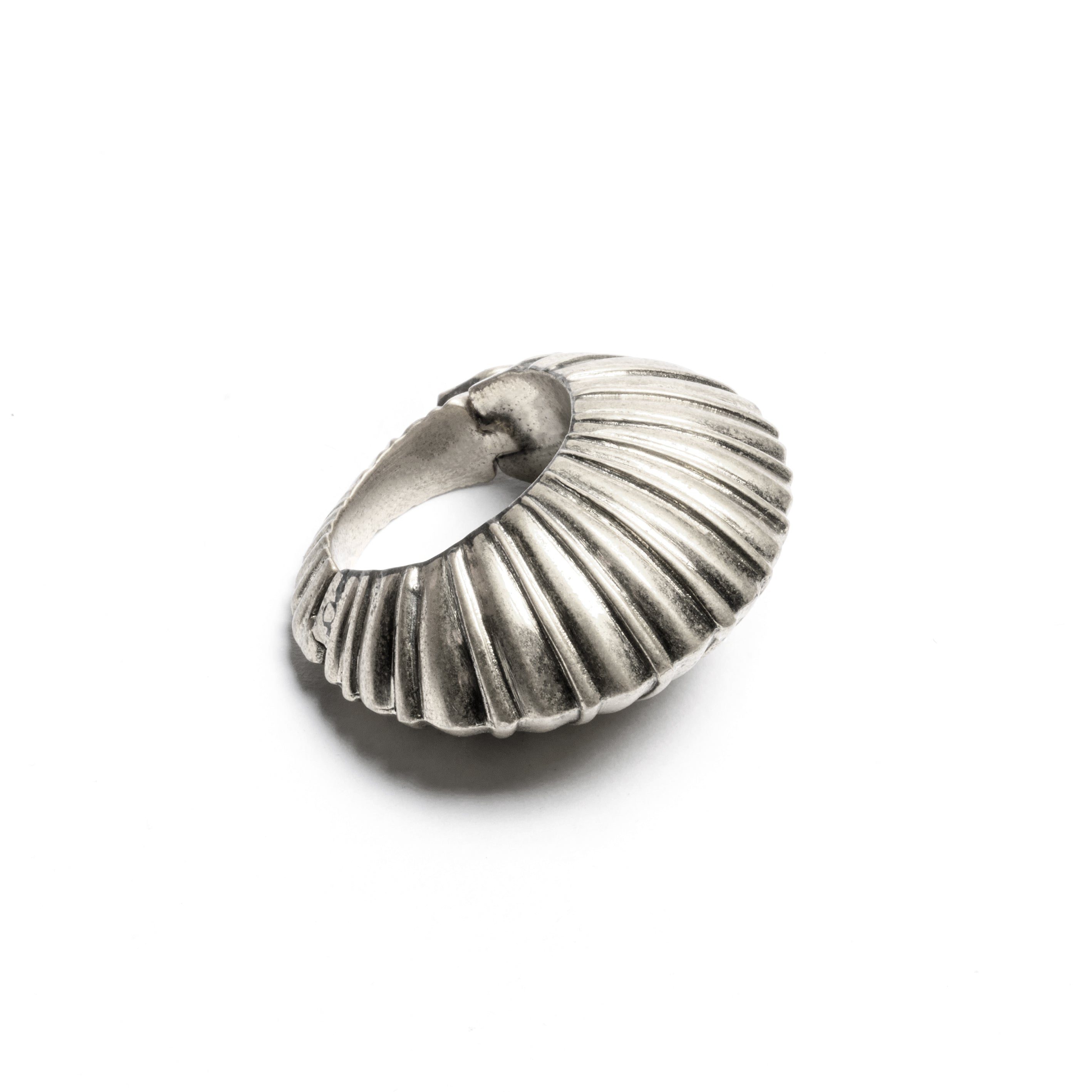 single silver brass carved ear weights hoops side close up view