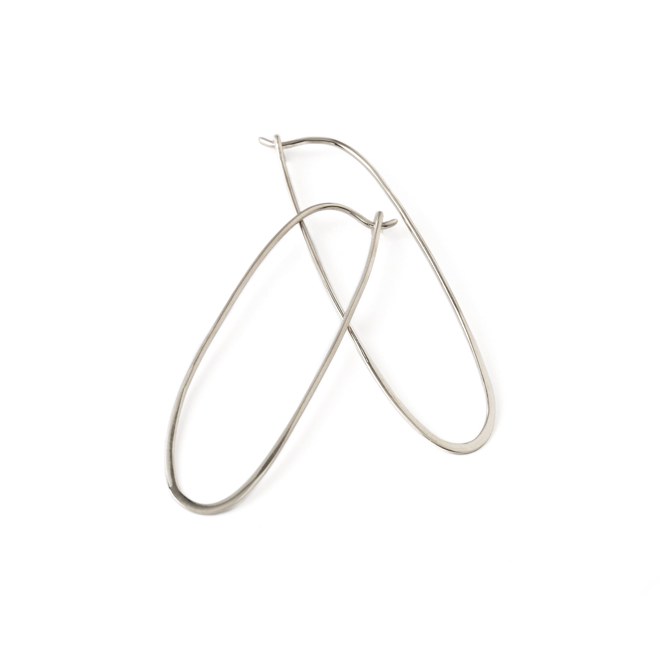 Long Oval Silver Hoops earrings frontal view