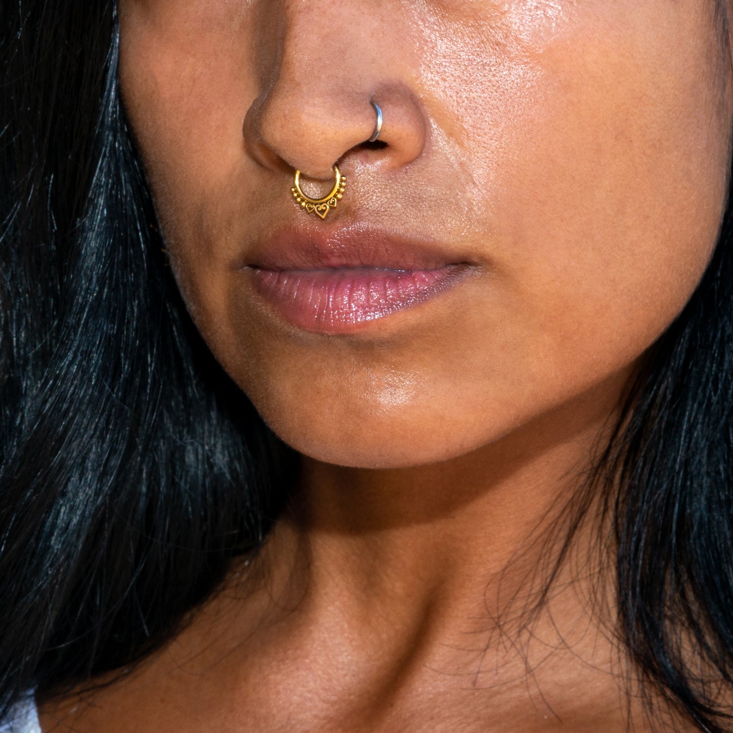 model wearing Neptune septum clicker