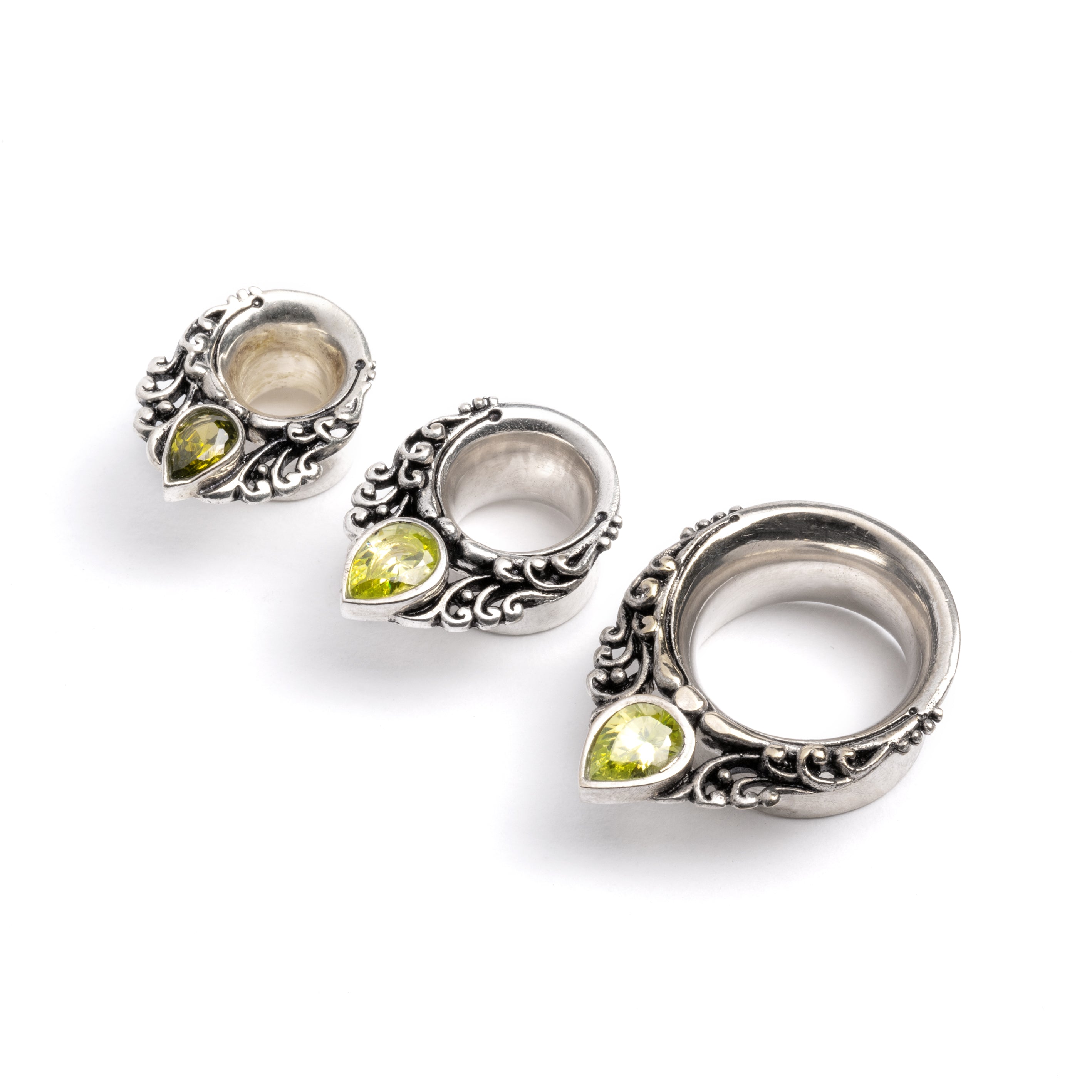 Maharishi ear saddles with Peridot frontal view