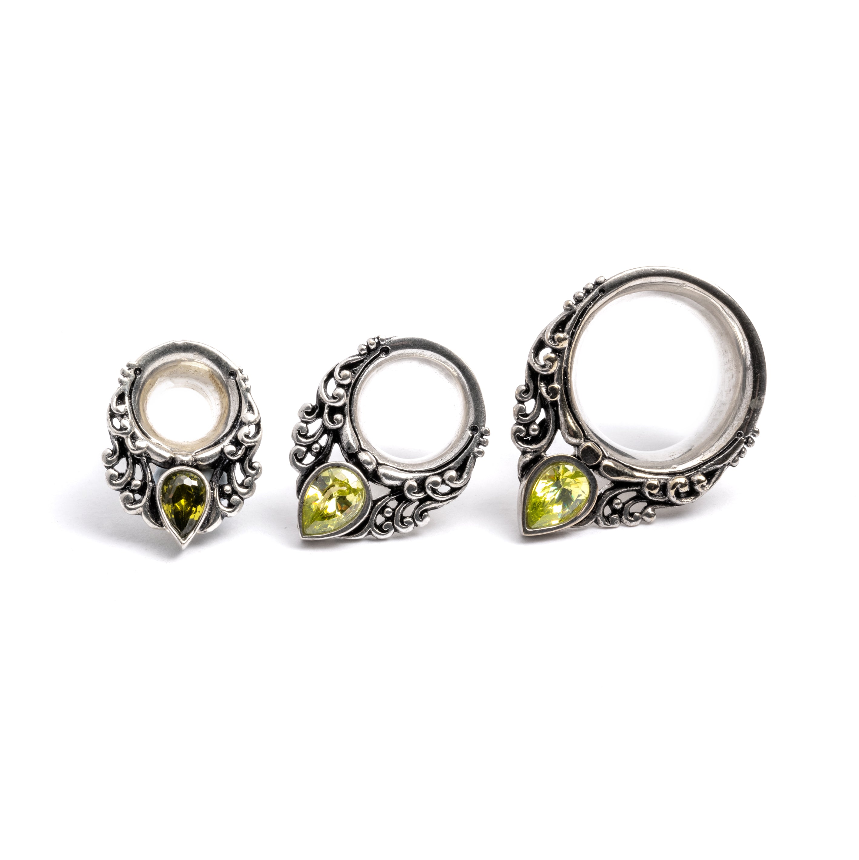 Maharishi ear saddles with Peridot frontal view