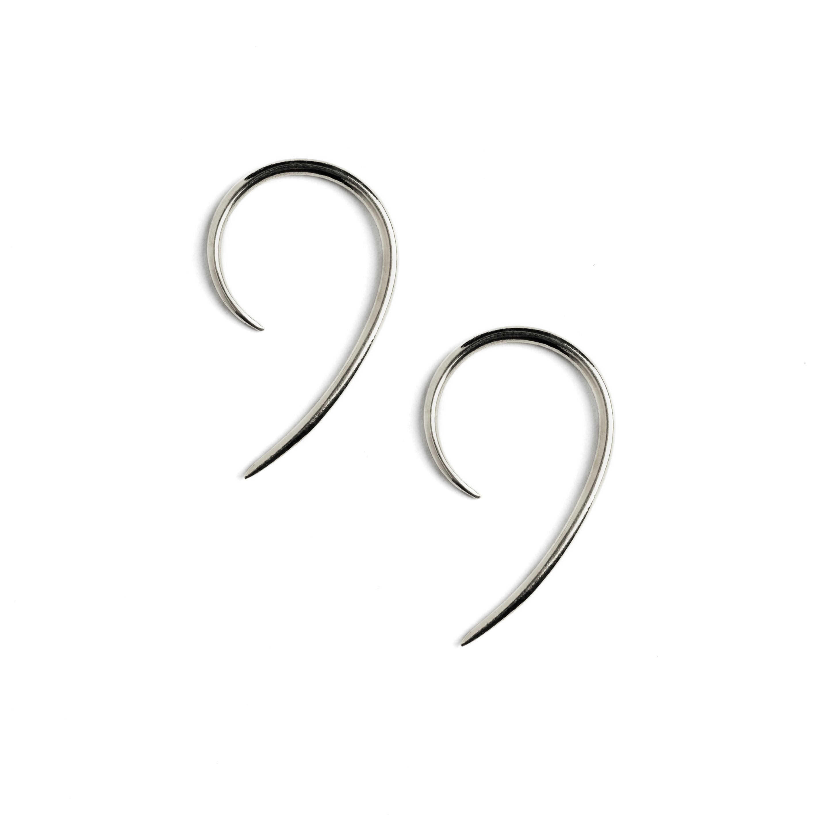 pair of silver wire hook earrings side view