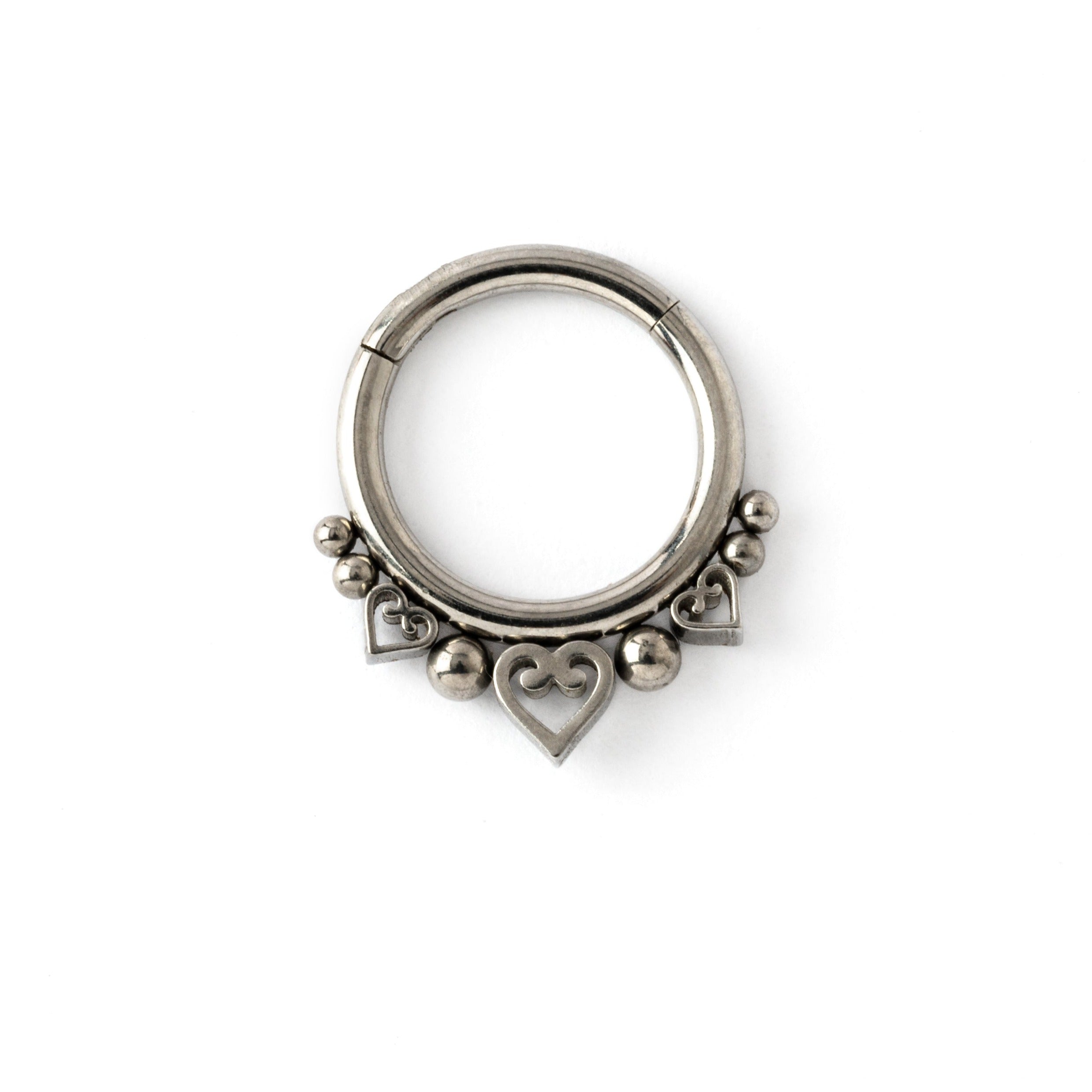 surgical steel hinged segment septum ring ornamented with tiny spheres and hearts