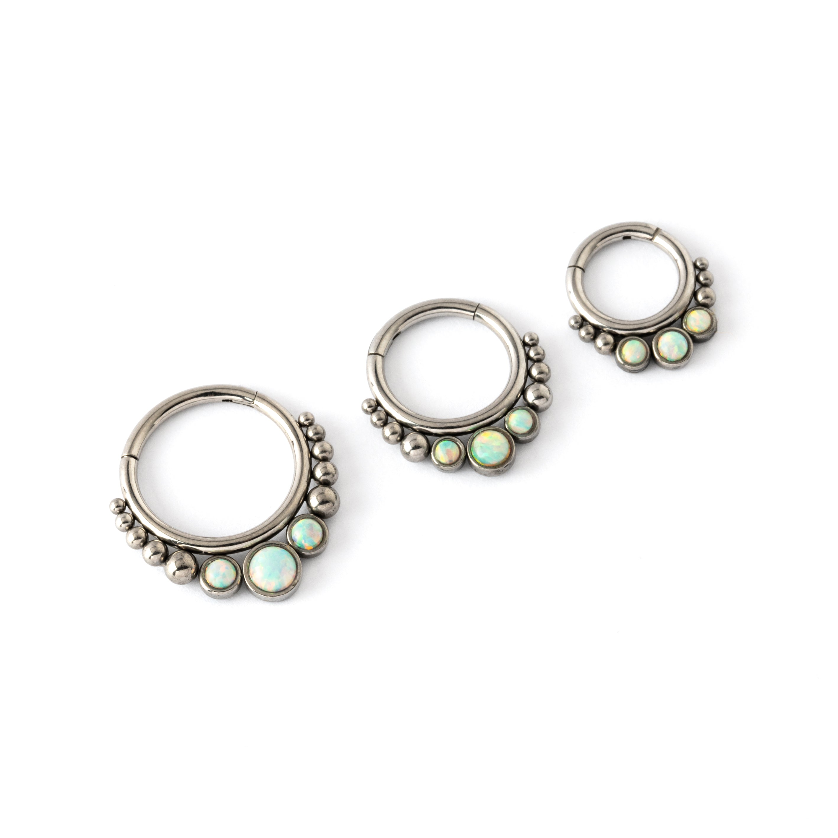 6mm, 8mm & 10mm Surgical steel septum clicker rings with Opal side view