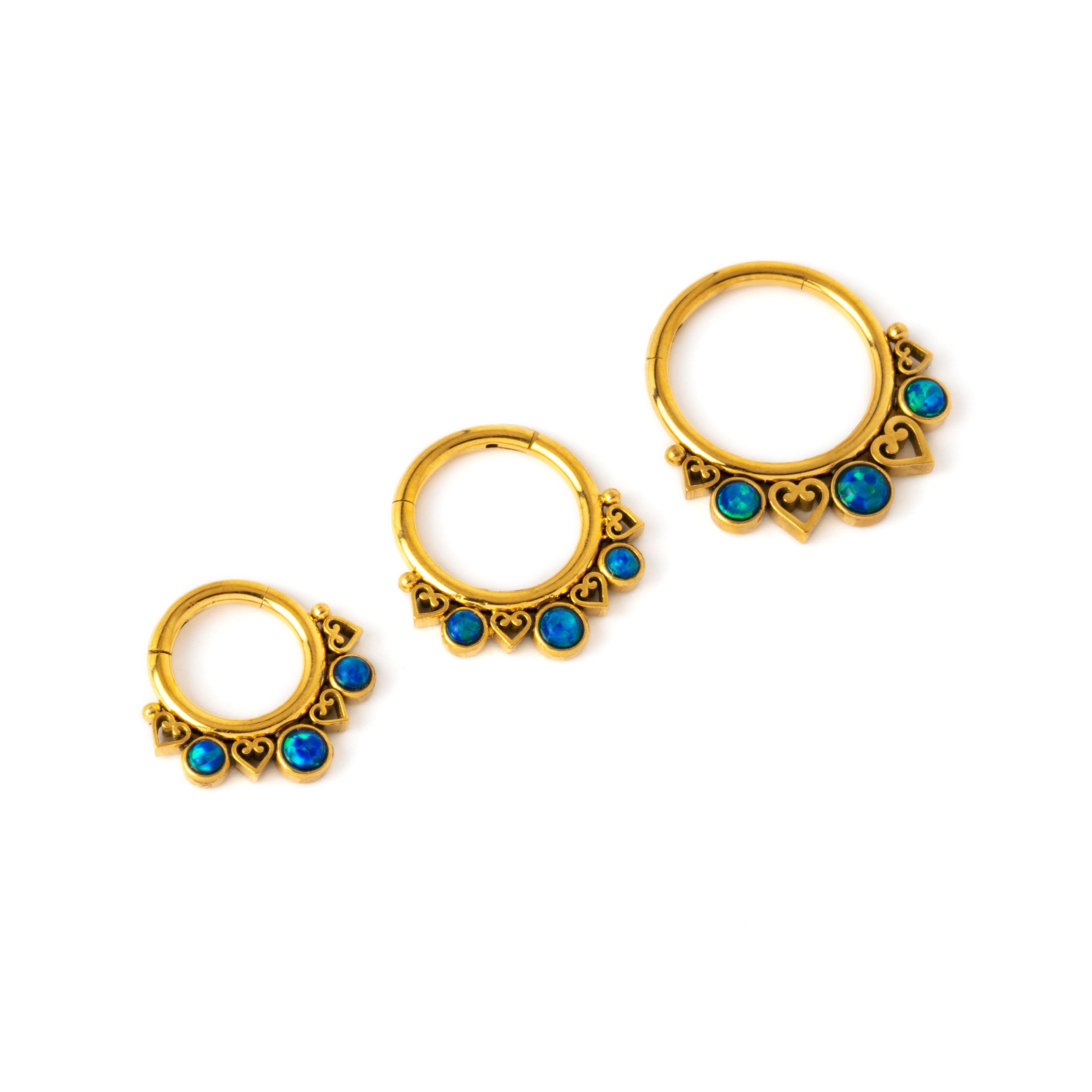 6mm, 8mm & 10mm golden neptune septum clickers with trio blue opals side view