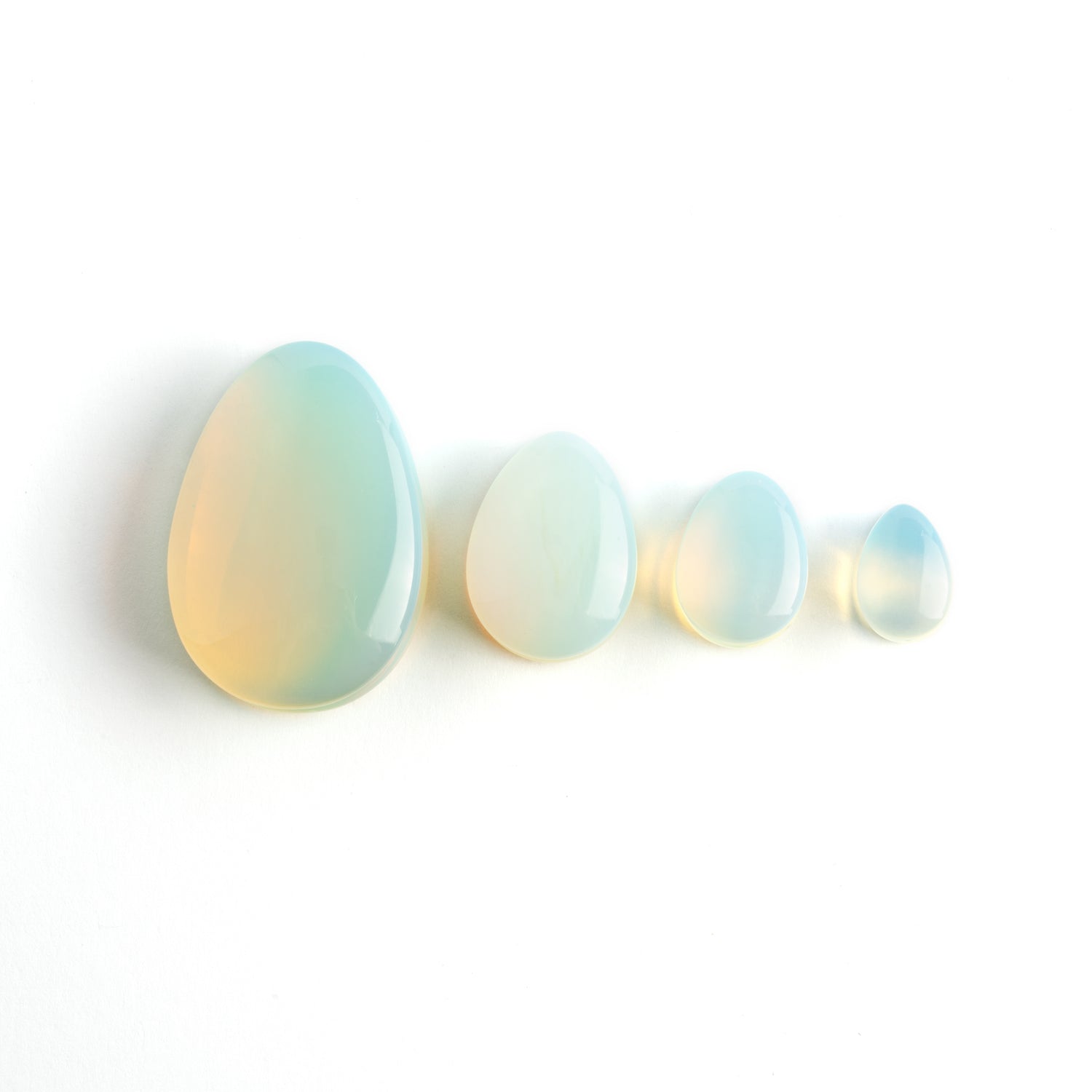 severy sizes of Opalite teardrop ear plugs frontal view