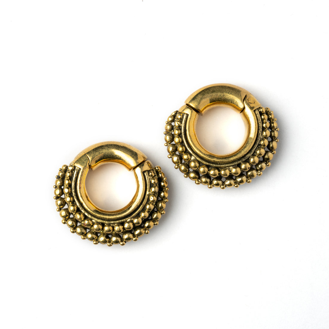 pair of gold brass chunky tribal ear weights hoops frontal view