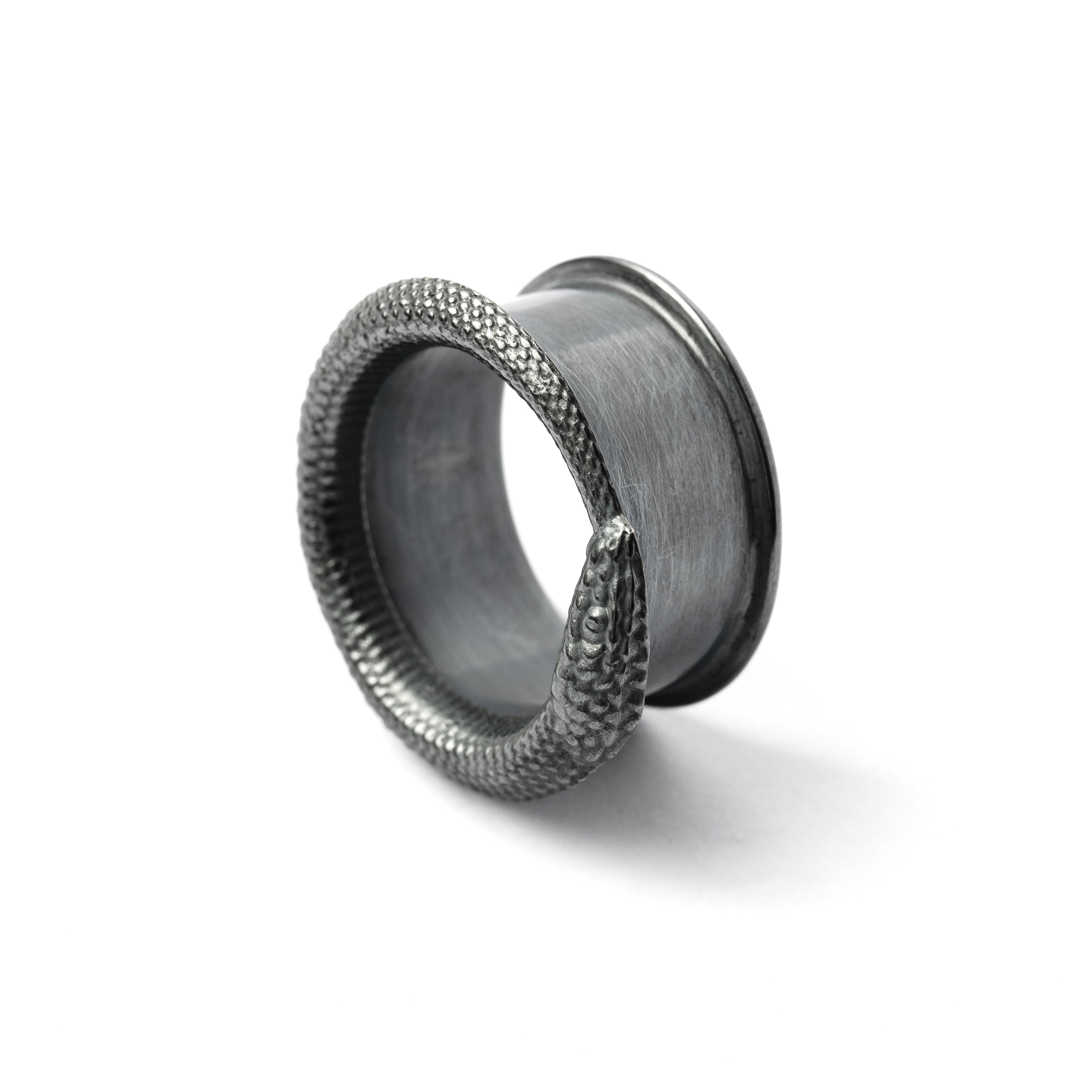 single Ouroboros black silver ear tunnel side view