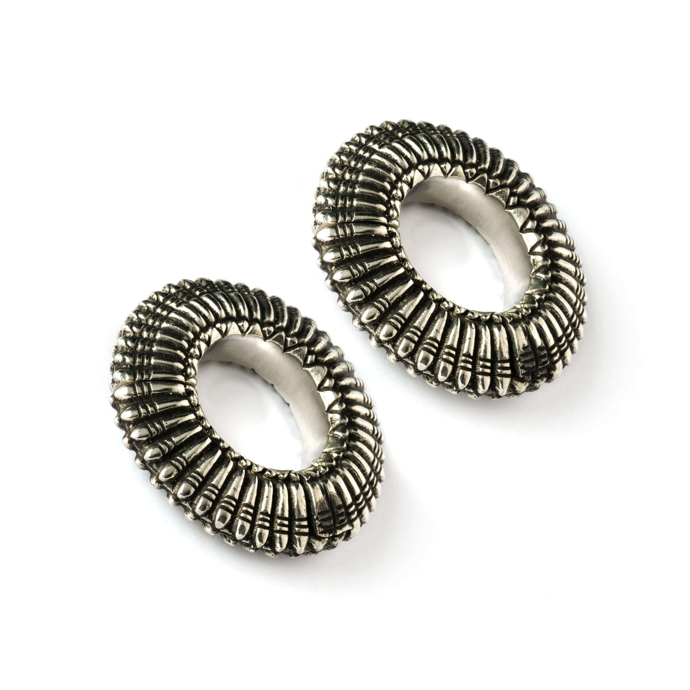 pair of Silver colour ear weight hoops with carved lines