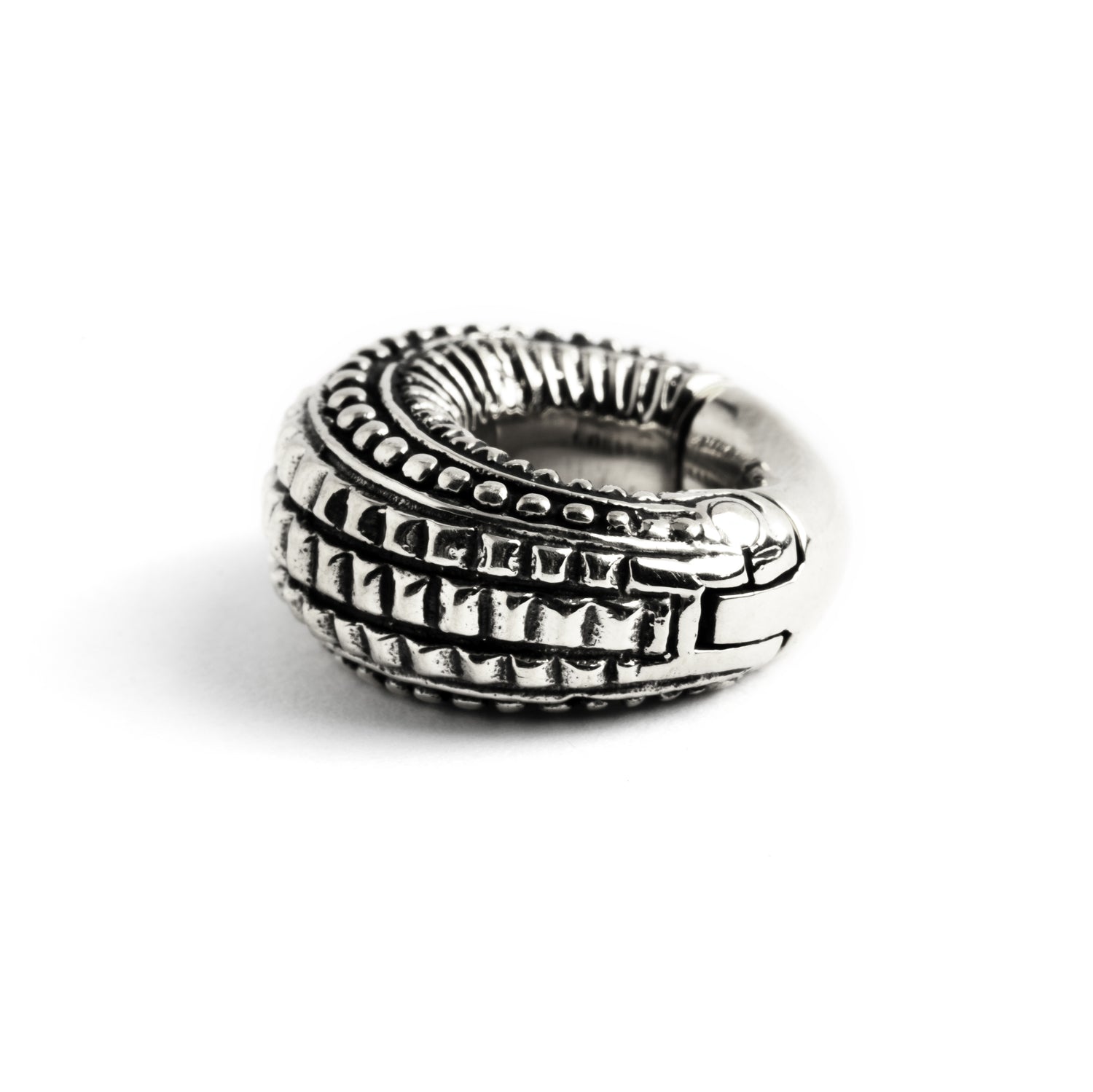 single 6g silver brass tribal ear weight hoop side close up view