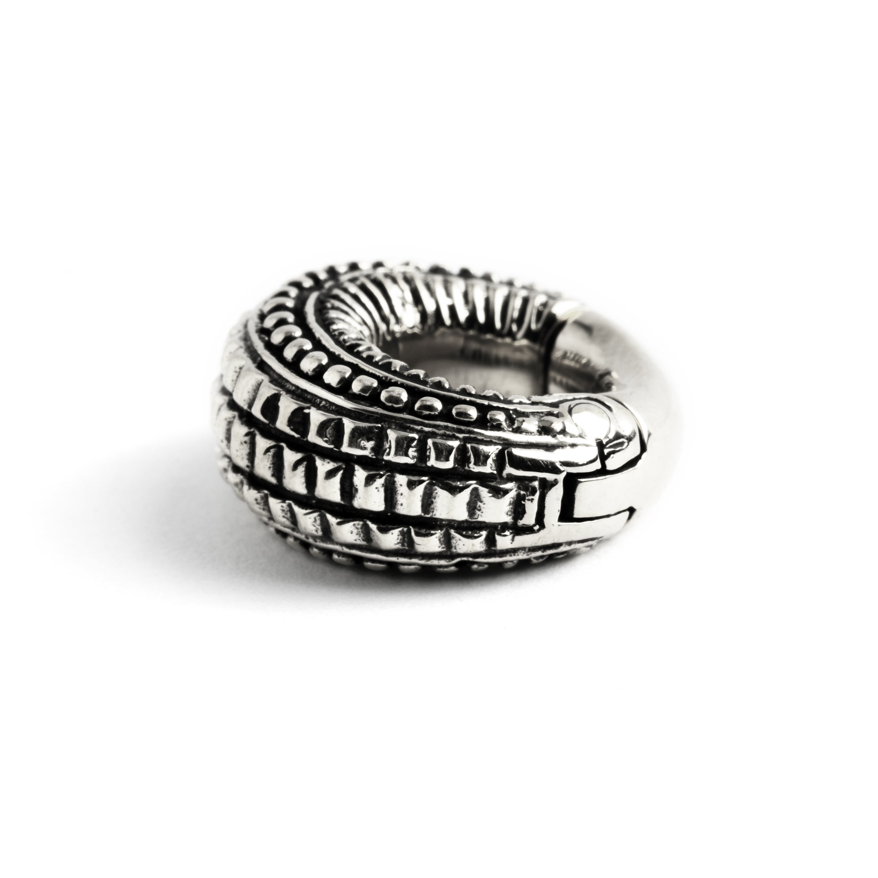 single 6g silver brass tribal ear weight hoop side close up view