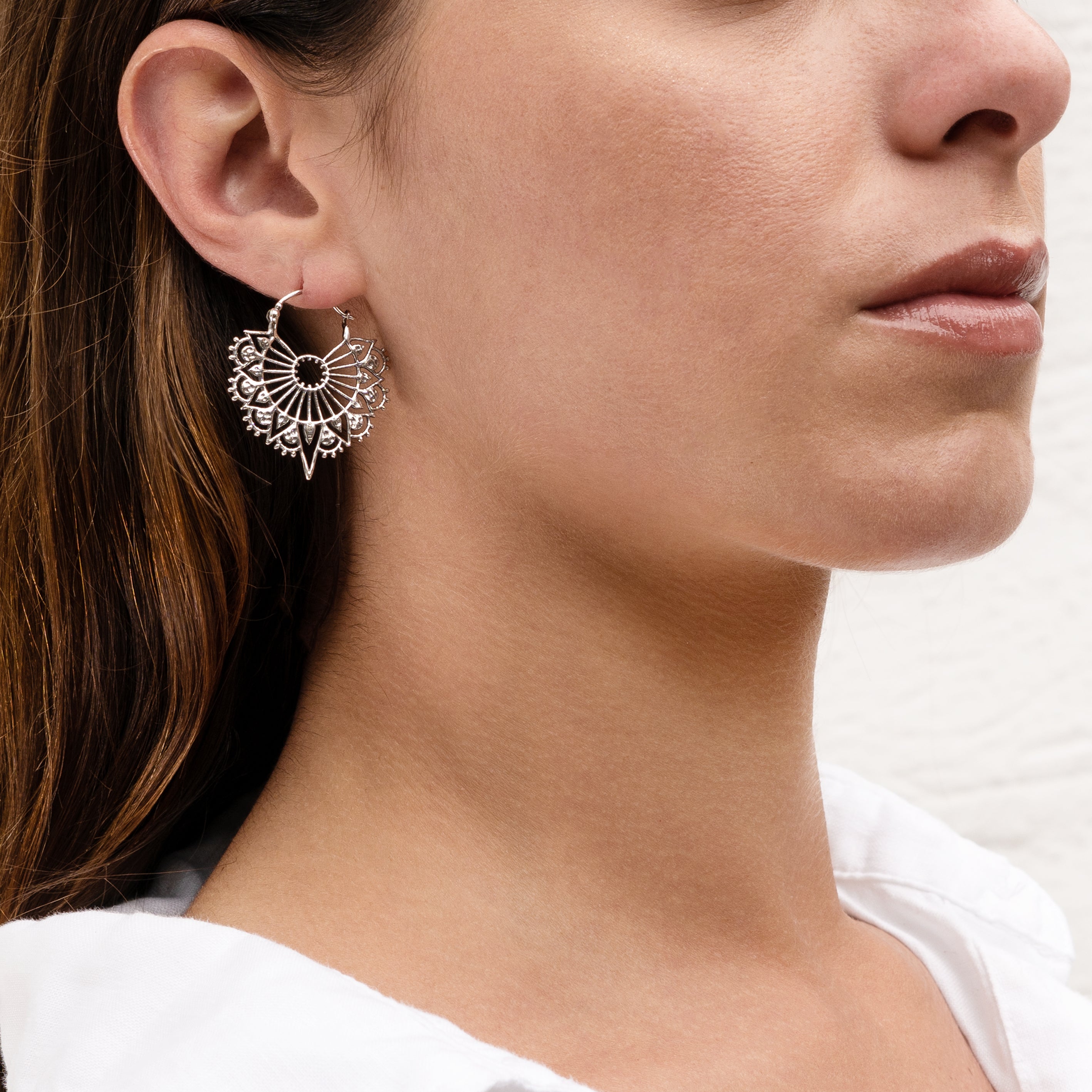 model wearing Vinyasa Silver earrings