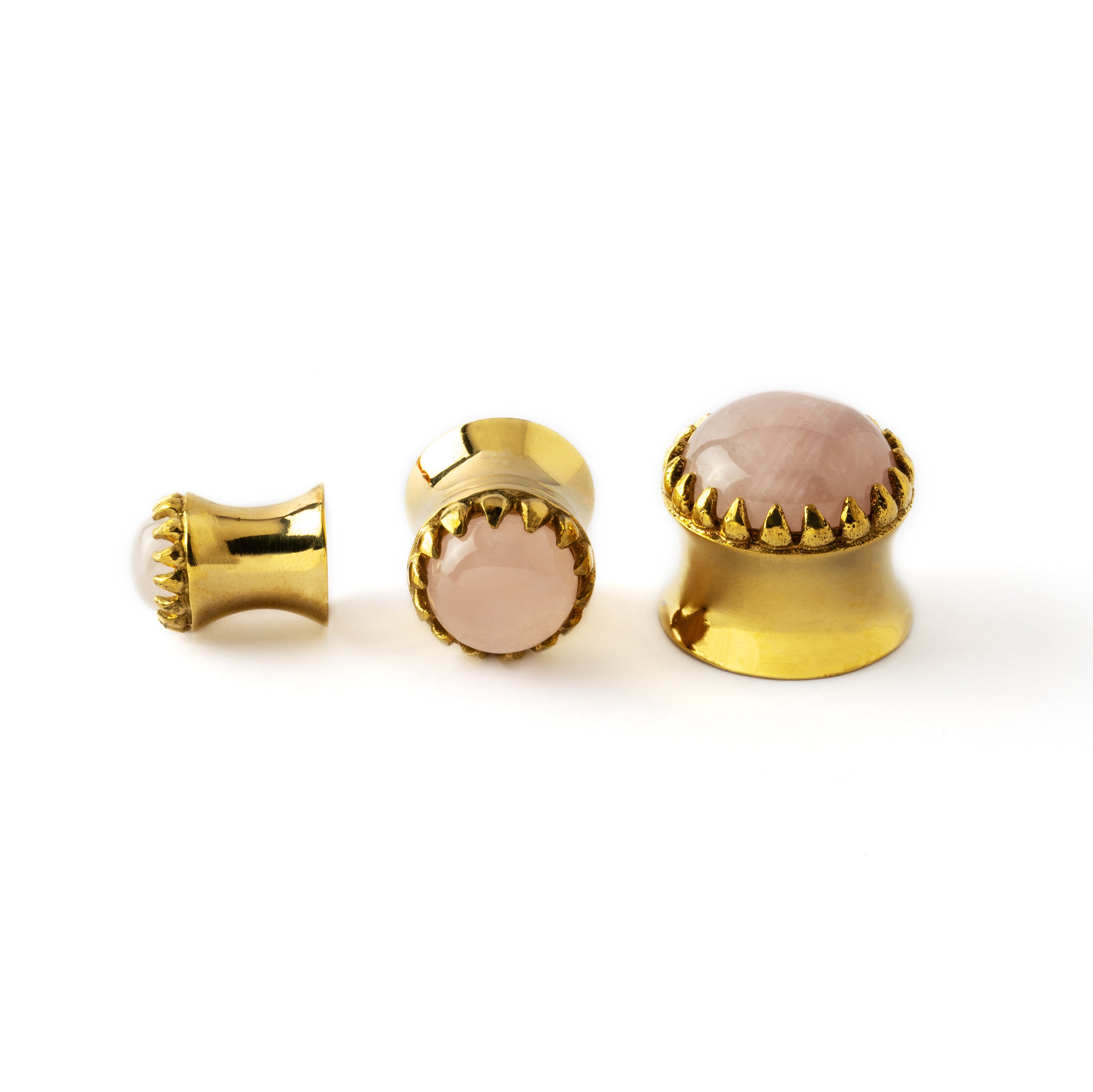 golden ear plug crown shaped with centred rose quartz in variety of sizes