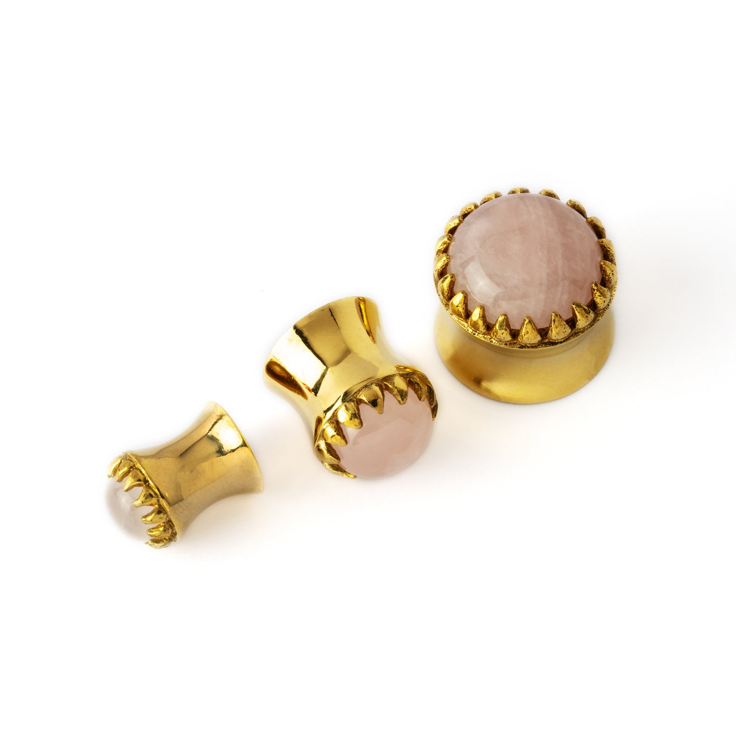 golden ear plugs crown shaped with centred rose quartz in different angles