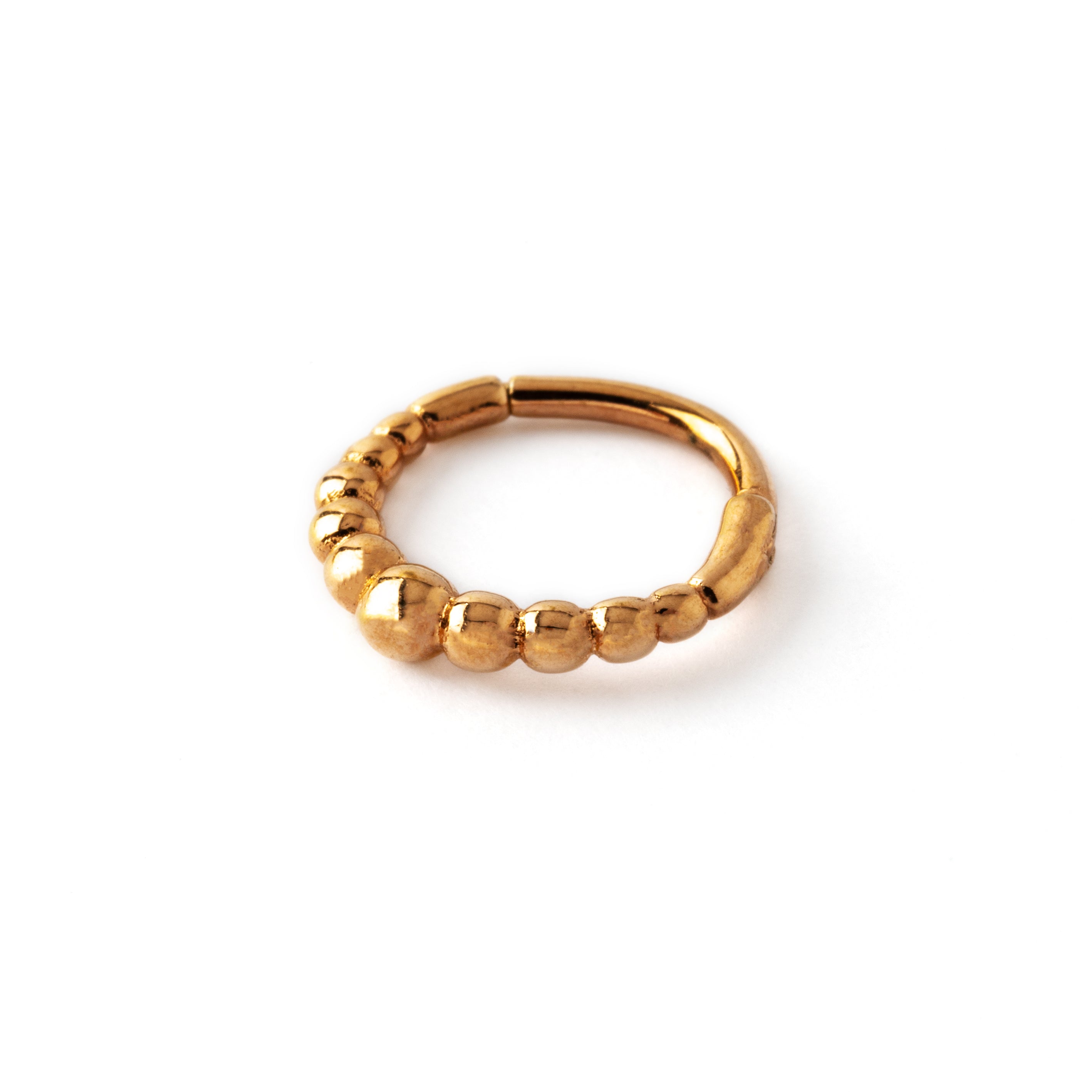 rose gold surgical steel clicker septum with tiny spheres down view