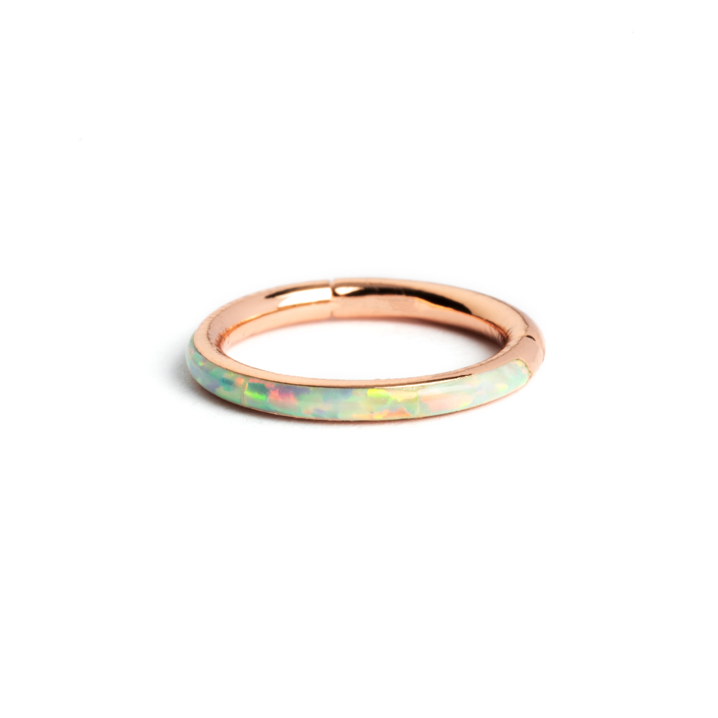 Rose Gold surgical steel septum clicker ring with white opal inlay frontal view