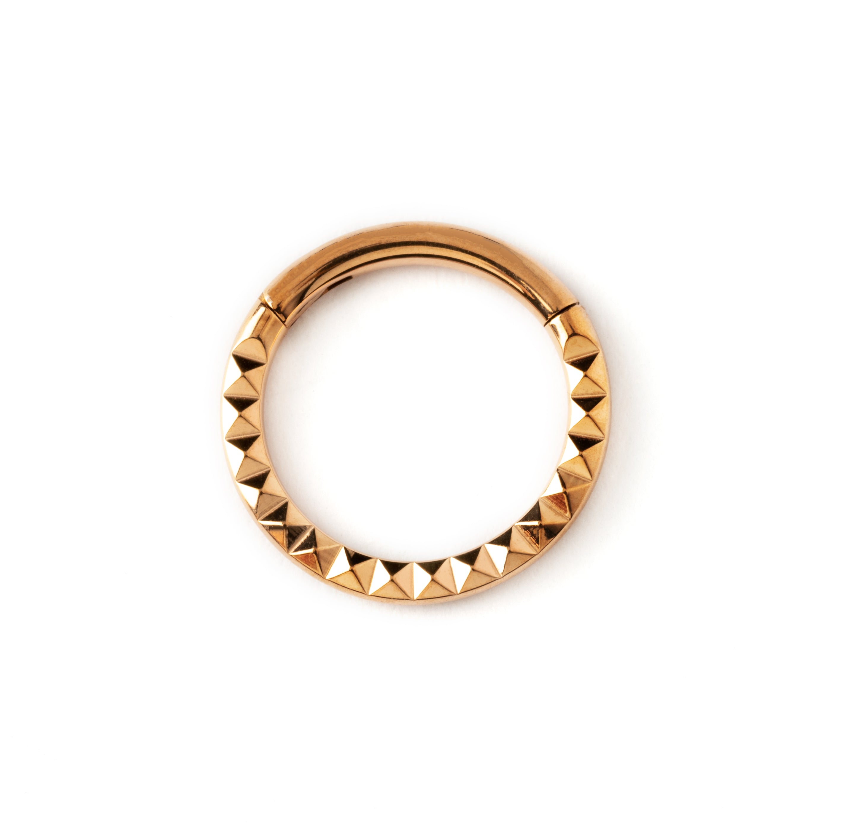 Giza rose gold surgical steel clicker ring with 3d pyramid patter frontal view