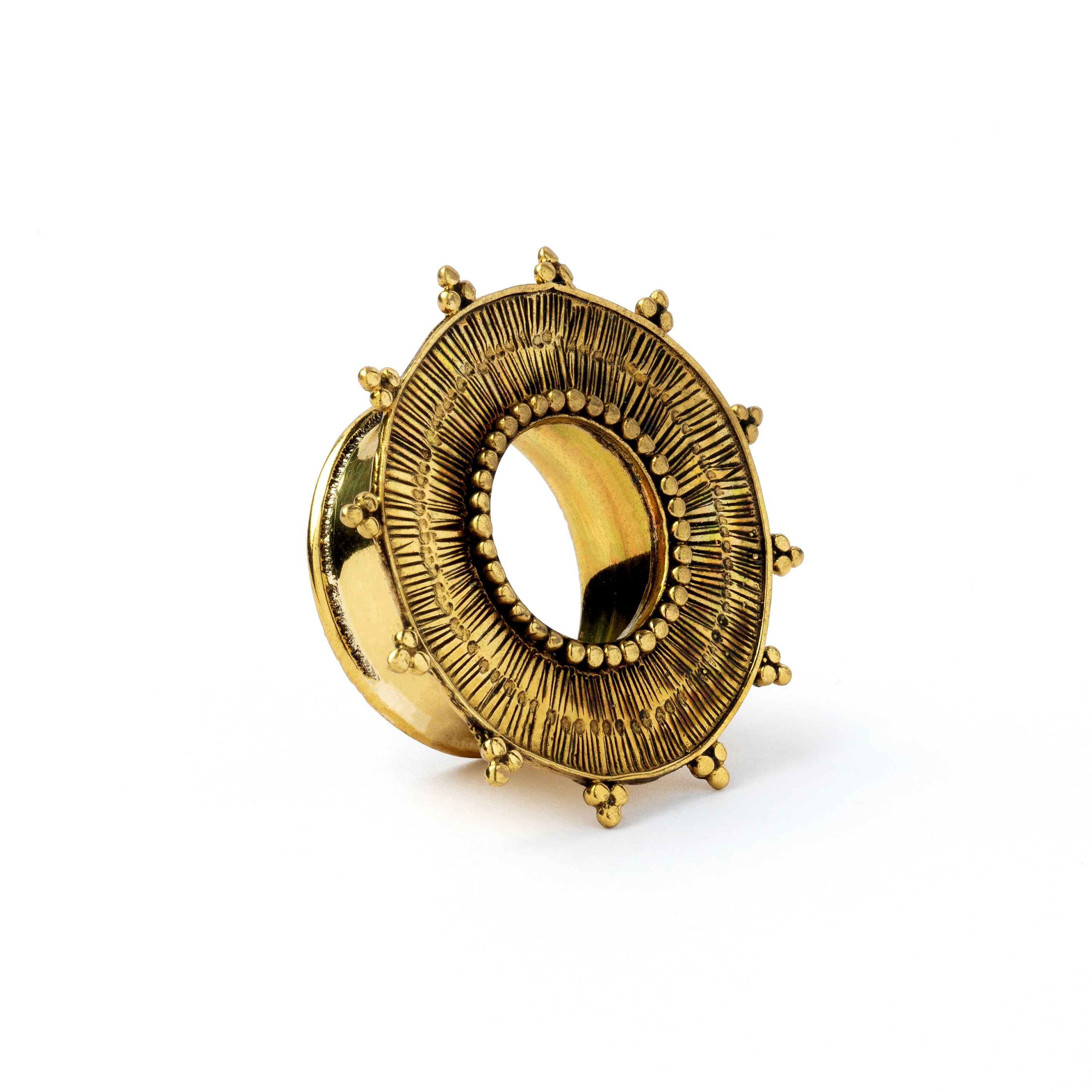 Rustic sun golden brass ear tunnel for stretched ears left side view