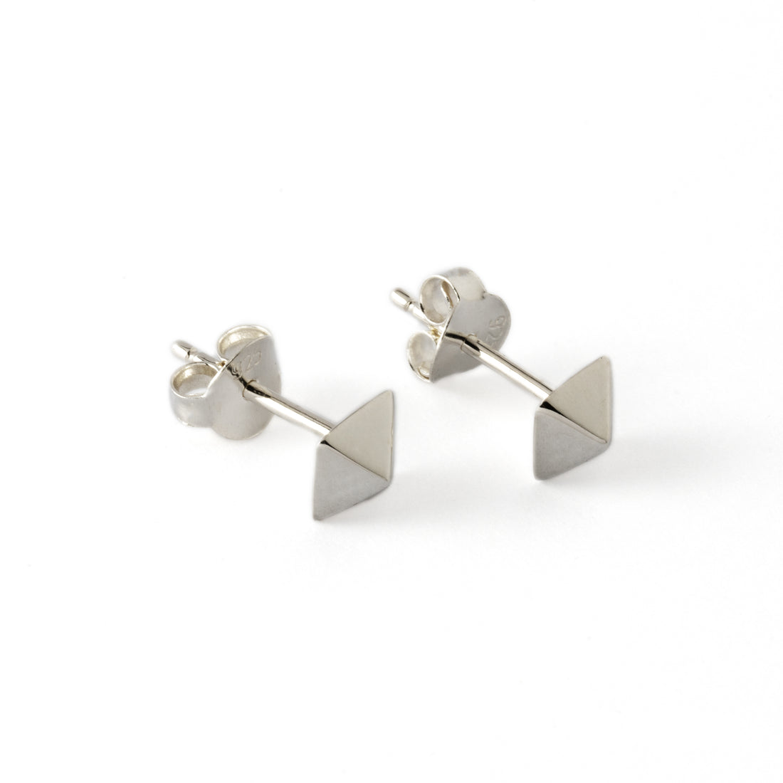 pair of Silver pyramid ear studs left side view