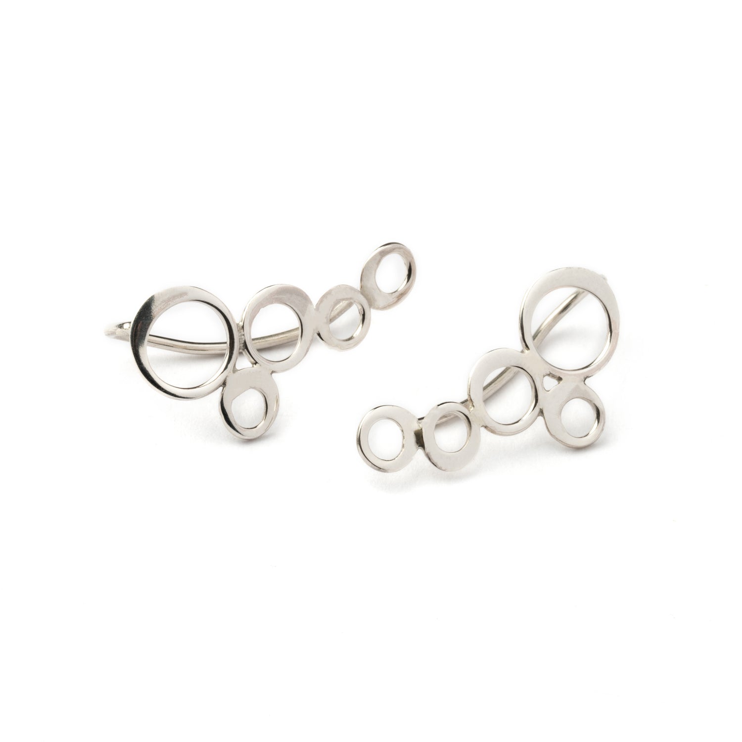 pair of silver circles ear climbers front view