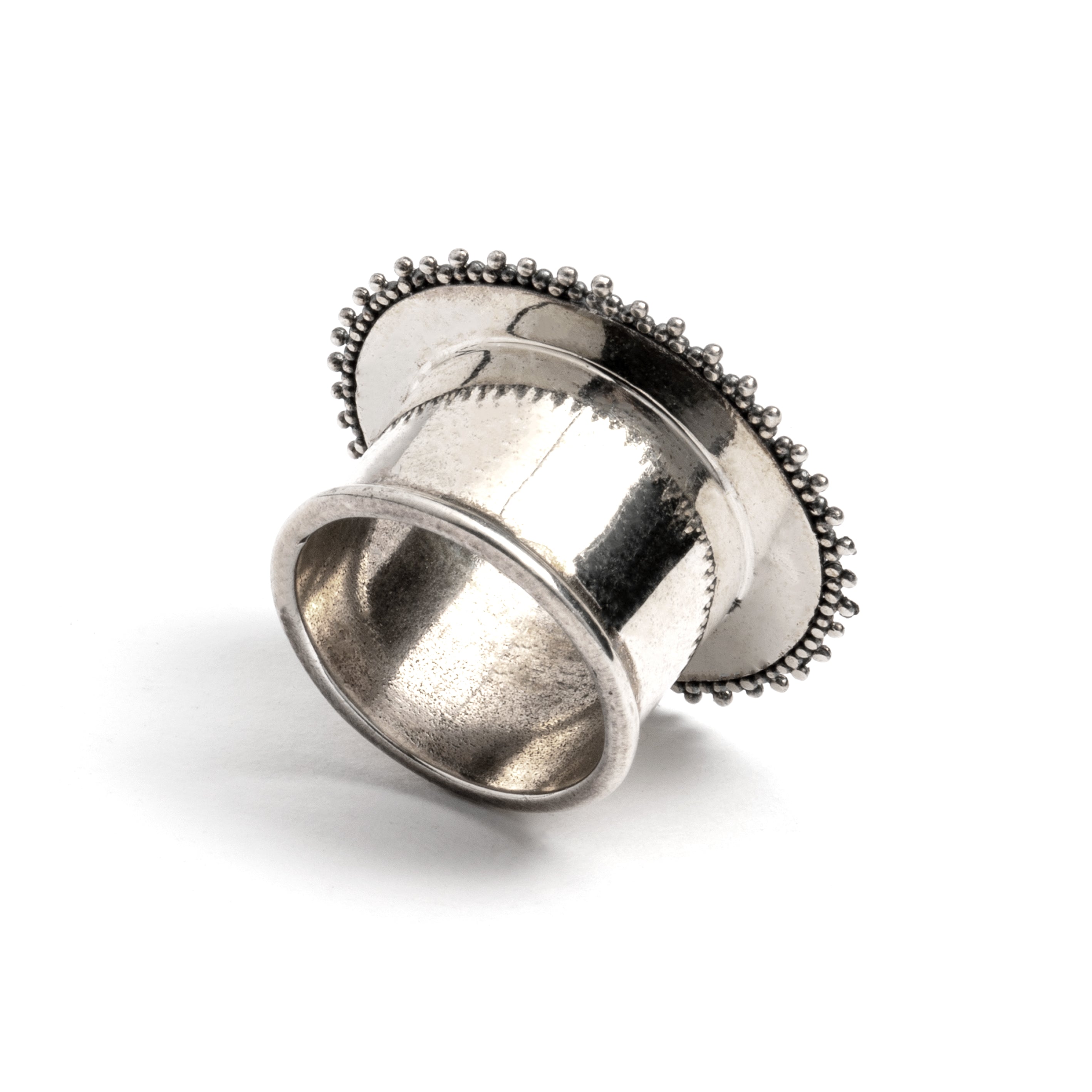 single silver Indian ear tunnel back view