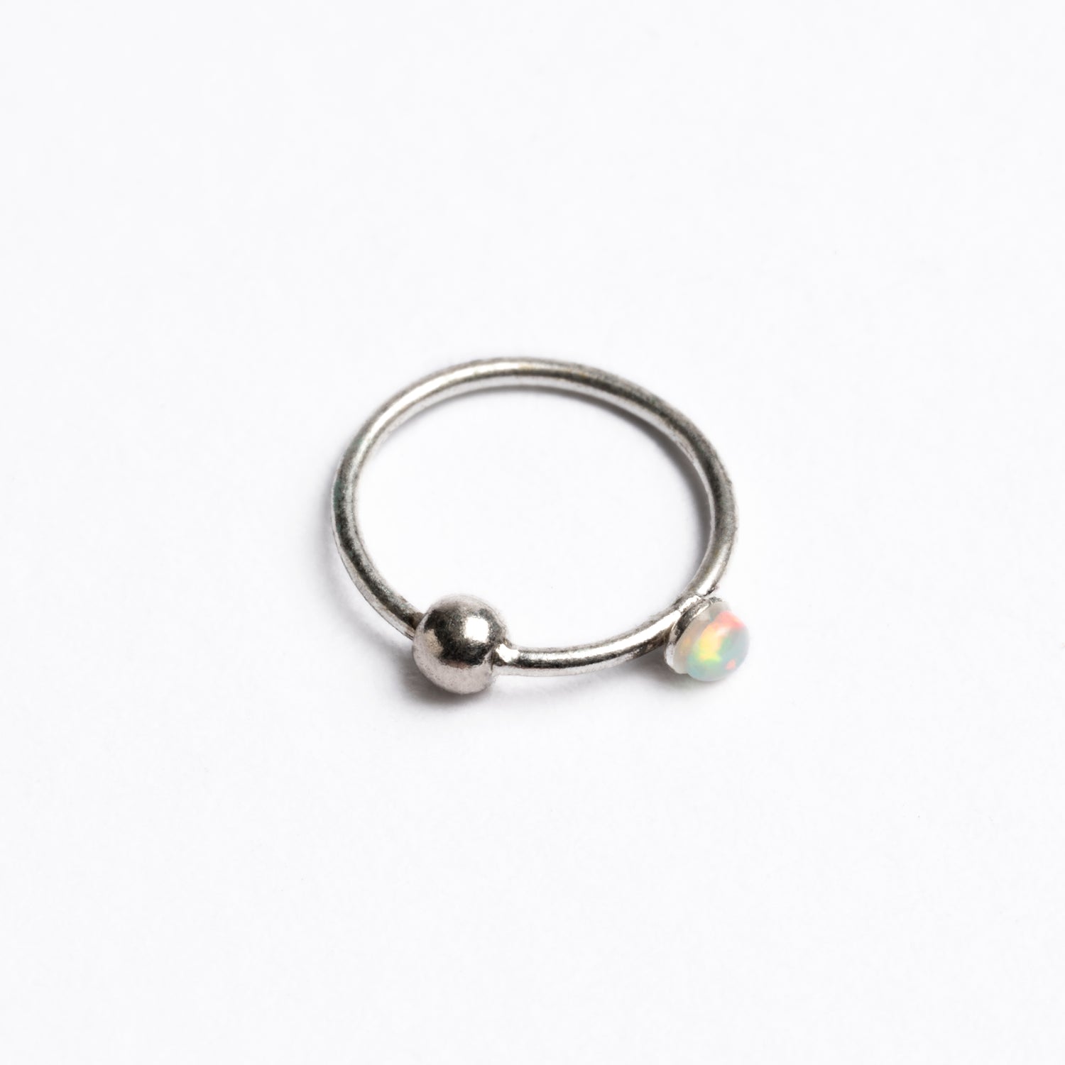 Silver nose ring with Opal side view