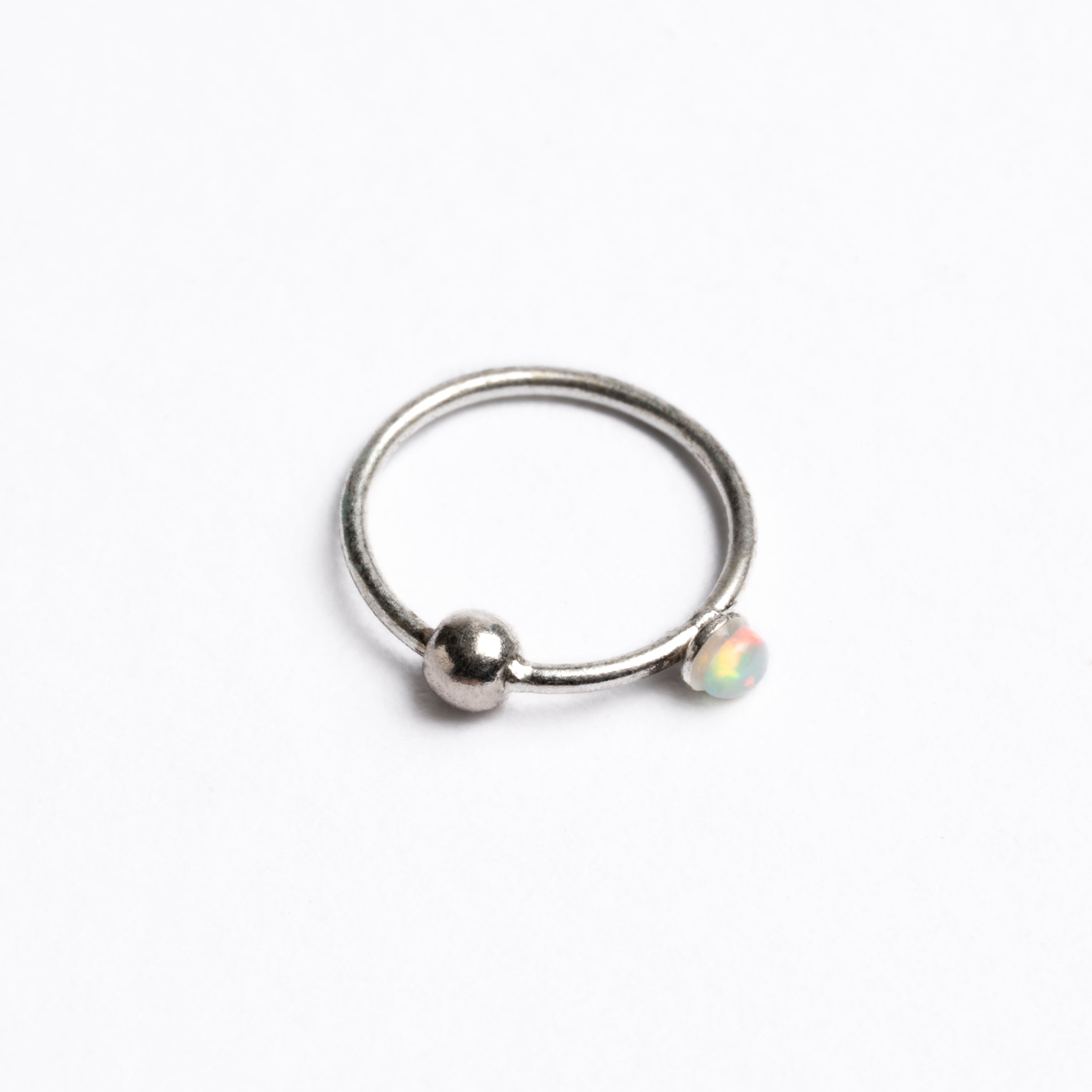 Silver nose ring with Opal side view