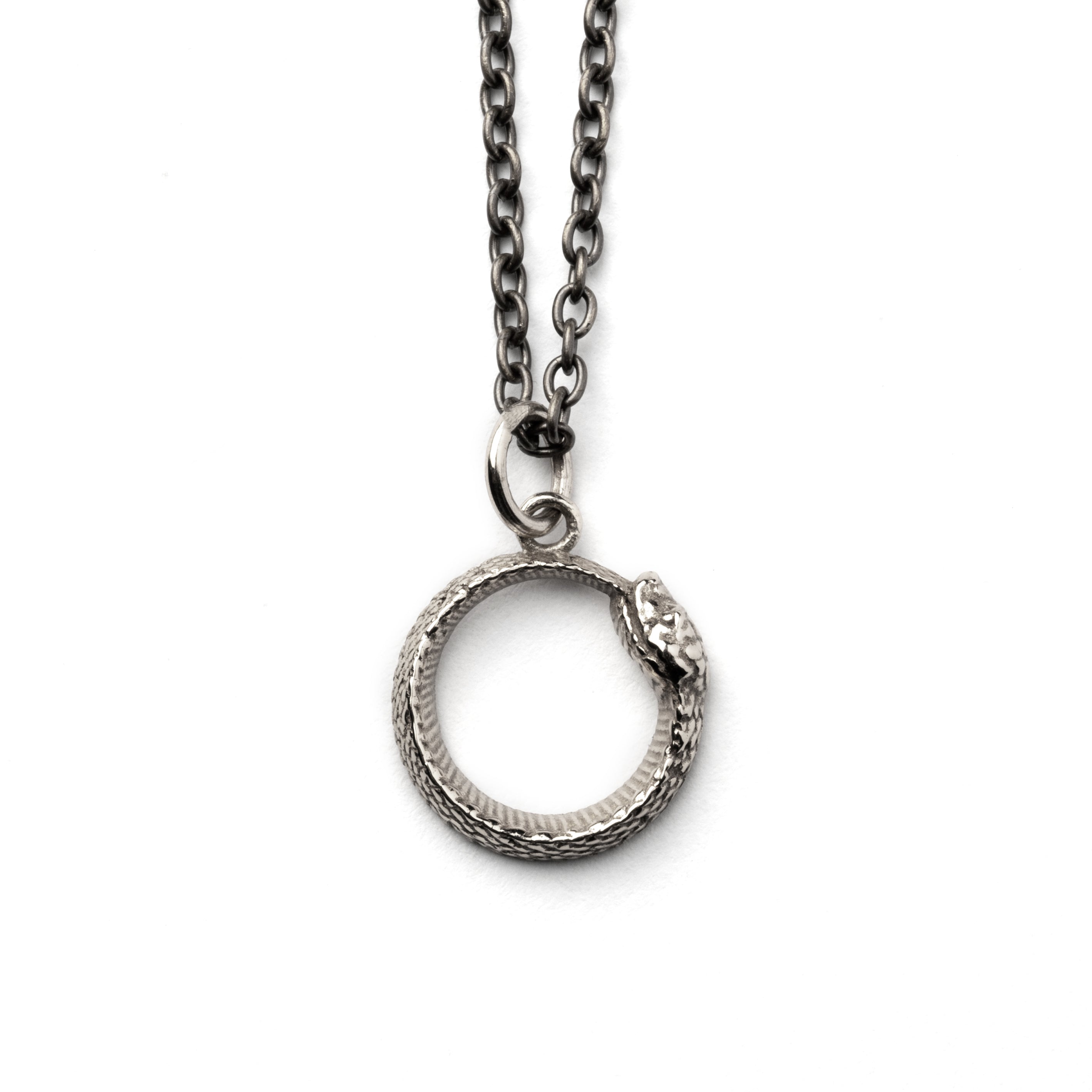 Tiny Silver Ouroboros Charm necklace frontal view