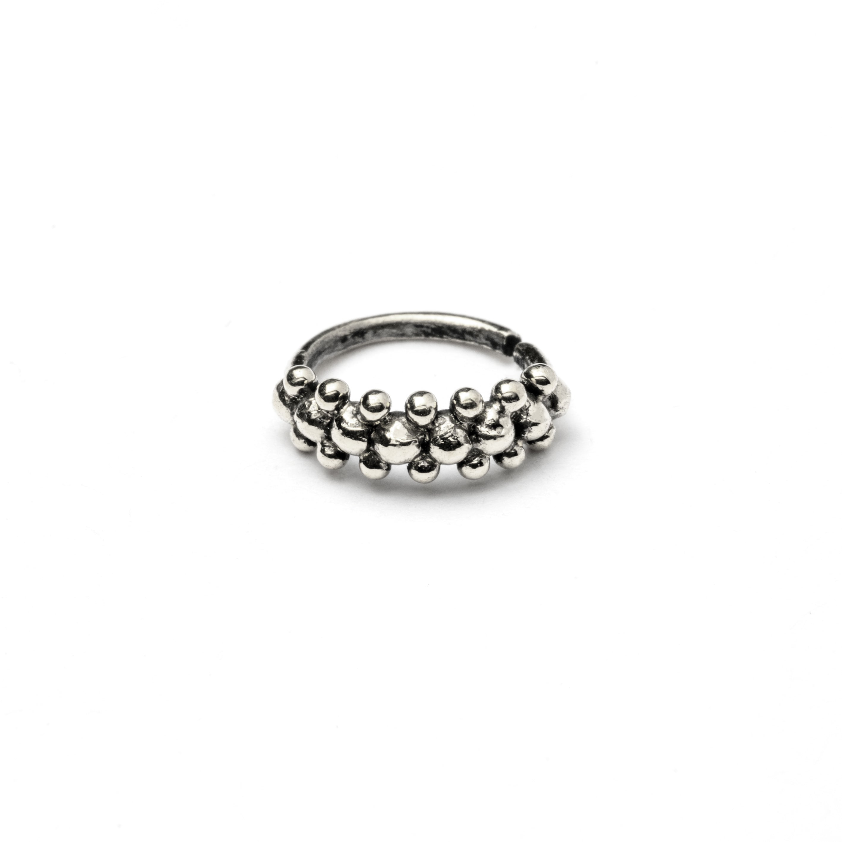 Double dotted silver nose ring frontal view