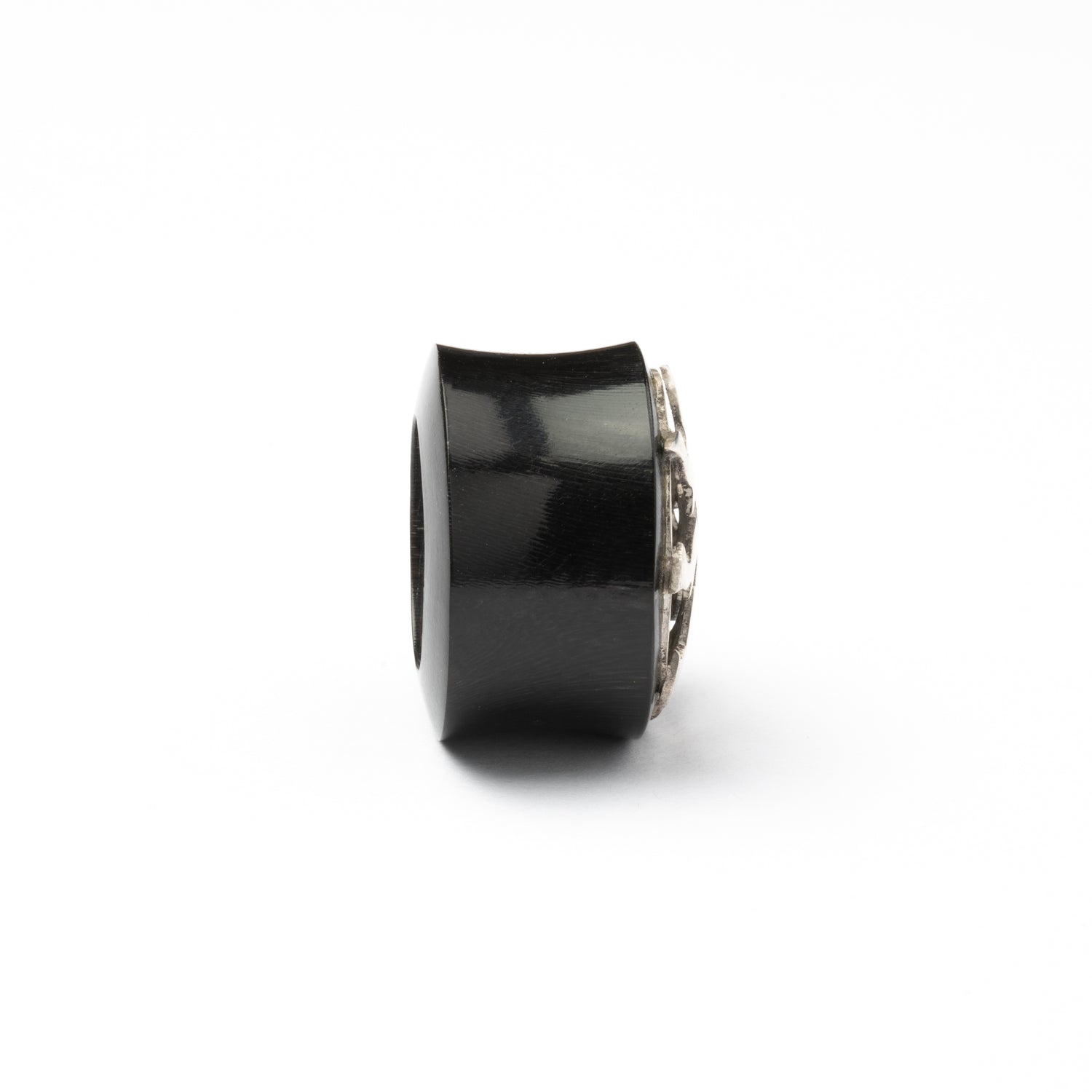 Silver in black Flesh Tunnel