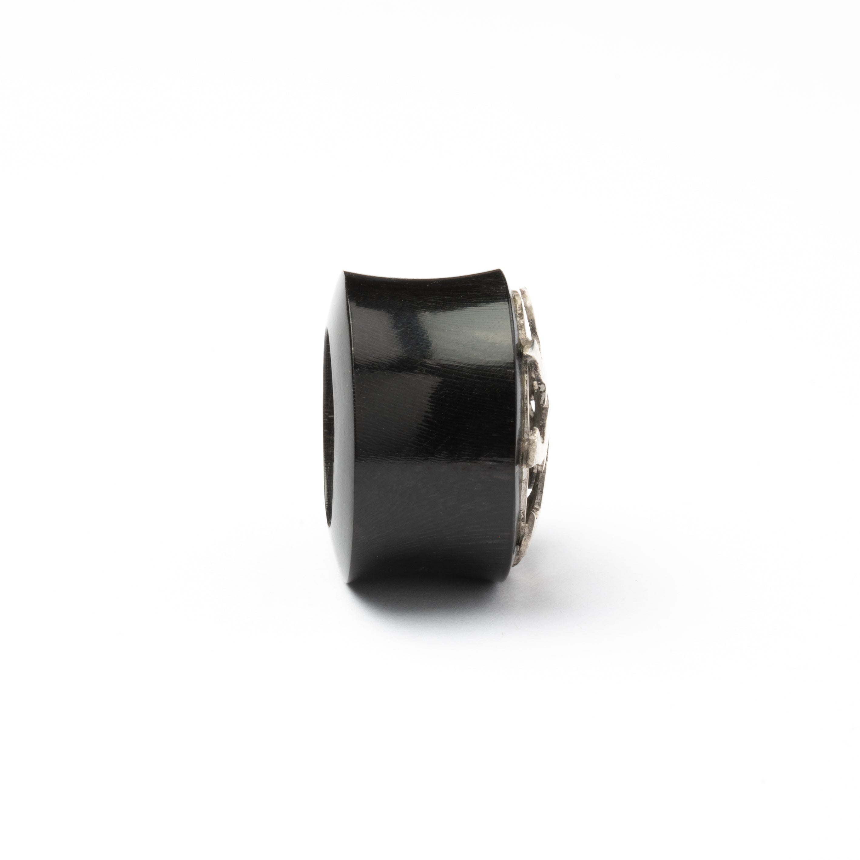 Silver in black Flesh Tunnel